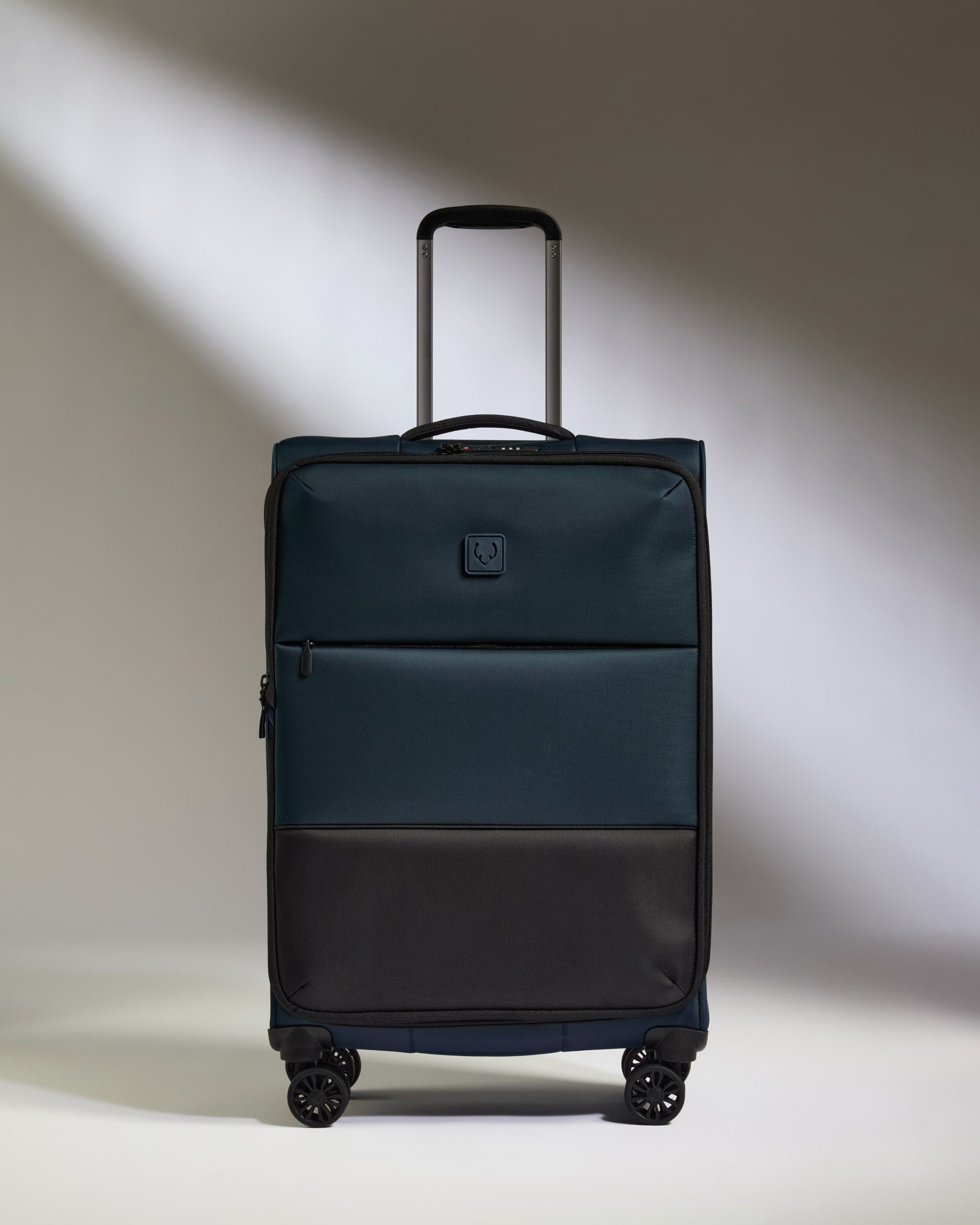 Antler Luggage -  Lightest Medium Suitcase in Indigo Blue - Soft Stripe 2.0 - Soft Suitcase Lightest Medium Suitcase in Navy - Soft Stripe 2.0 | Soft Suitcase