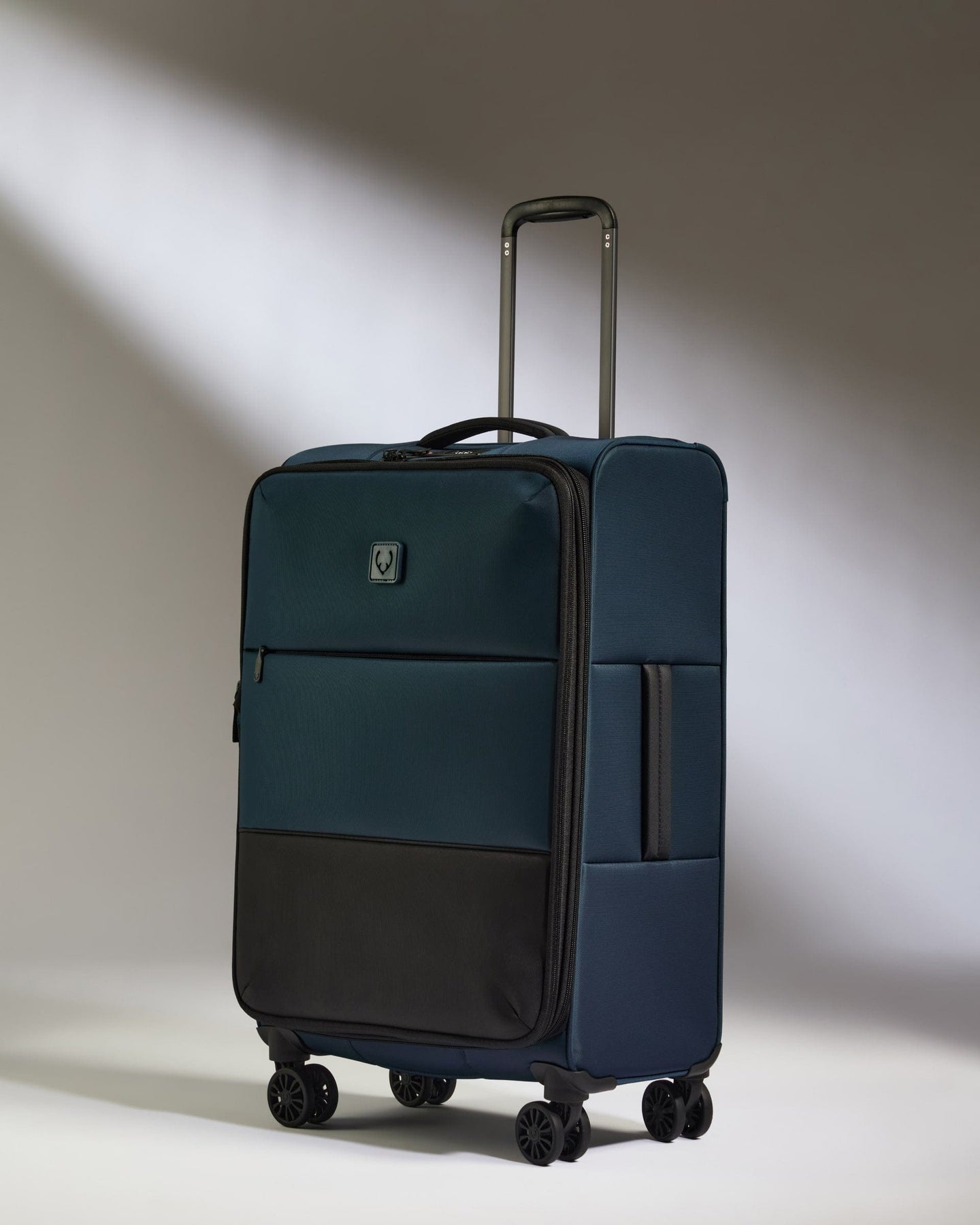 Antler Luggage -  Lightest Medium Suitcase in Indigo Blue - Soft Stripe 2.0 - Soft Suitcase Lightest Medium Suitcase in Navy - Soft Stripe 2.0 | Soft Suitcase