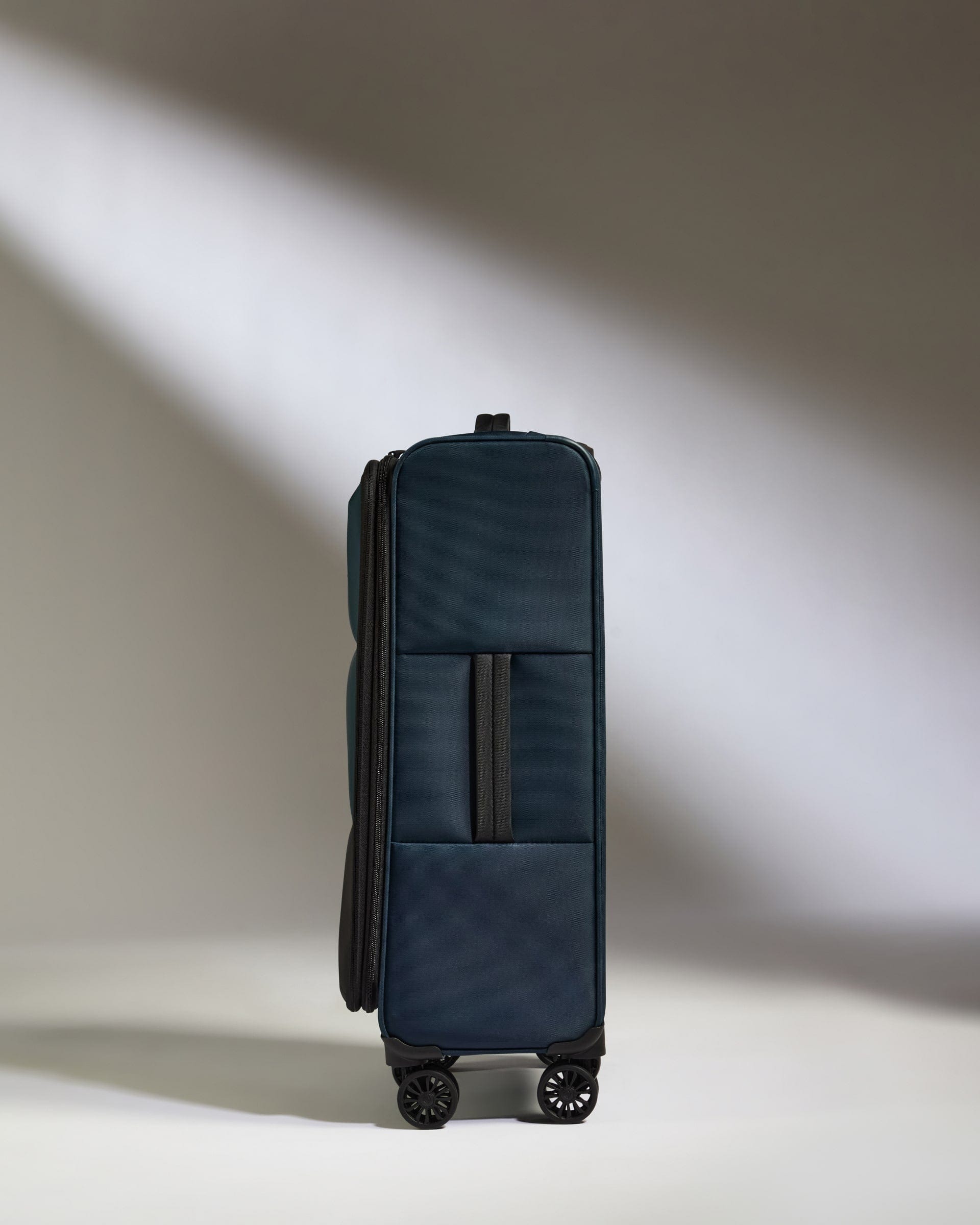 Antler Luggage -  Lightest Medium Suitcase in Indigo Blue - Soft Stripe 2.0 - Soft Suitcase Lightest Medium Suitcase in Navy - Soft Stripe 2.0 | Soft Suitcase