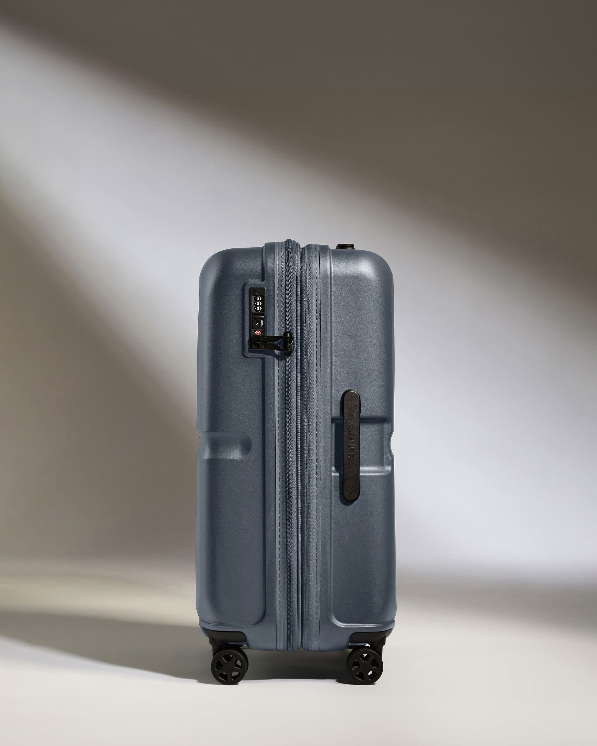 Antler Luggage -  Medium Suitcase in Atlantic Grey - Single Stripe - Hard Suitcase - Medium Medium Suitcase in Grey - Single Stripe | Check Luggage