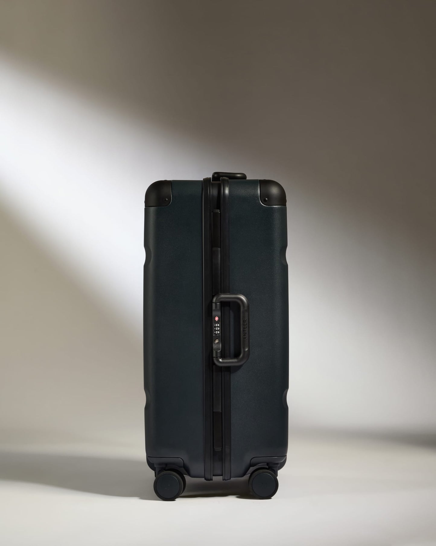 Antler Luggage -  Medium Suitcase in Basalt Navy - Heritage Stripe - Hard Suitcase Medium Suitcase in Basalt Navy - Heritage Stripe | Premium Hard Shell Trunk Luggage