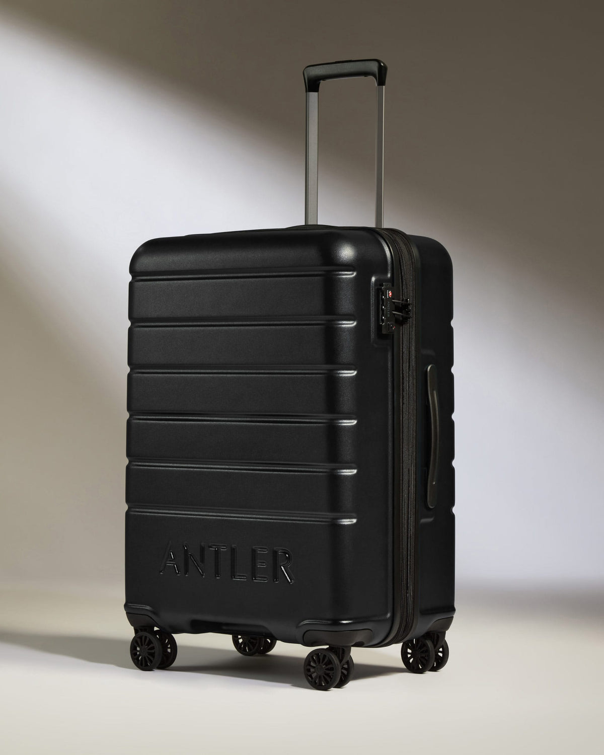 Antler Luggage -  Medium Suitcase in Black - Logo - Hard Suitcases Medium Suitcase Black - Logo | Lightweight Hard Shell Luggage