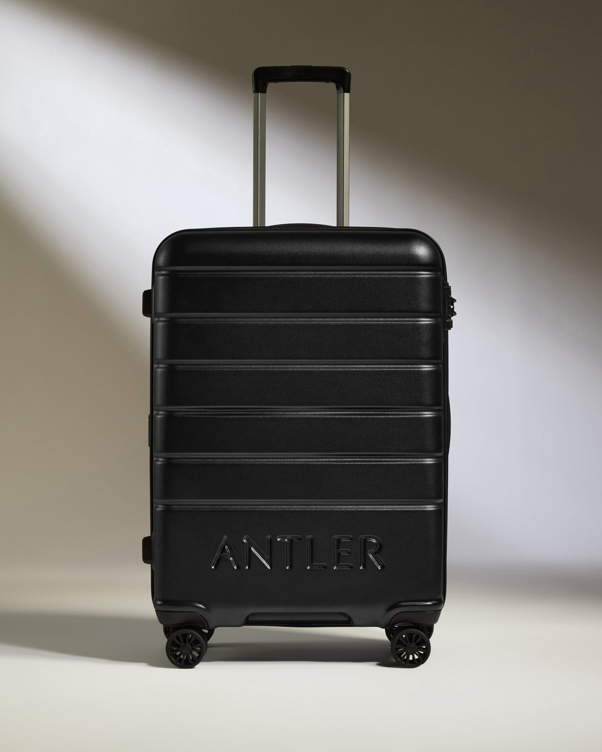 Antler Luggage -  Medium Suitcase in Black - Logo - Hard Suitcases Medium Suitcase Black - Logo | Lightweight Hard Shell Luggage