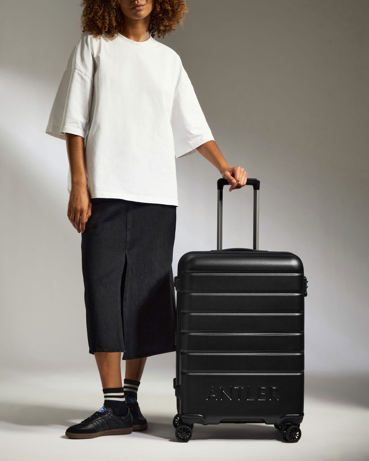 Antler Luggage -  Medium Suitcase in Black - Logo - Hard Suitcases Medium Suitcase Black - Logo | Lightweight Hard Shell Luggage