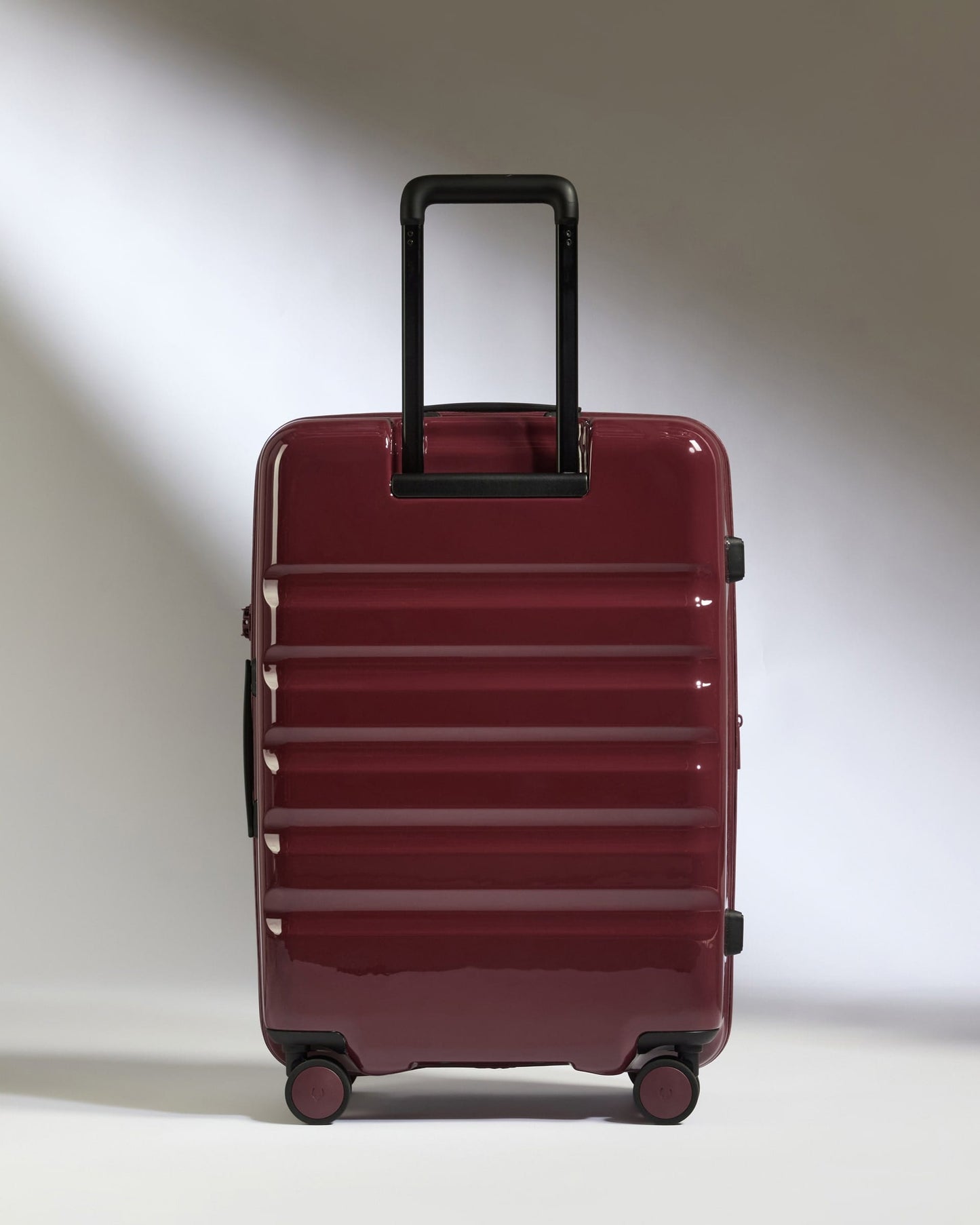 Antler Luggage -  Medium Suitcase in Cedar Red Gloss - Icon Stripe - Hard Suitcase Medium Suitcase in Red Gloss - Icon Stripe | Lightweight & Hard Shell Suitcase