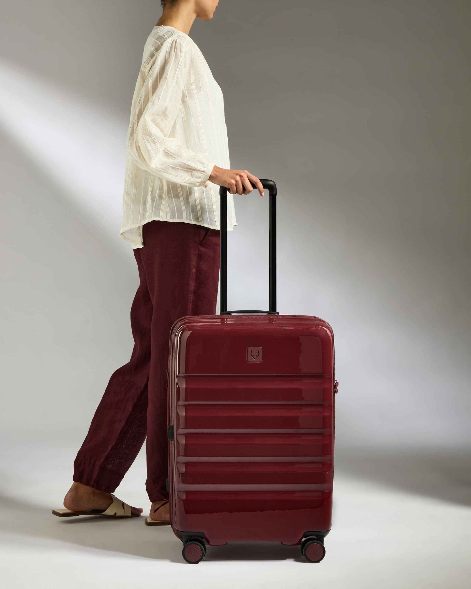 Antler Luggage -  Medium Suitcase in Cedar Red Gloss - Icon Stripe - Hard Suitcase Medium Suitcase in Red Gloss - Icon Stripe | Lightweight & Hard Shell Suitcase