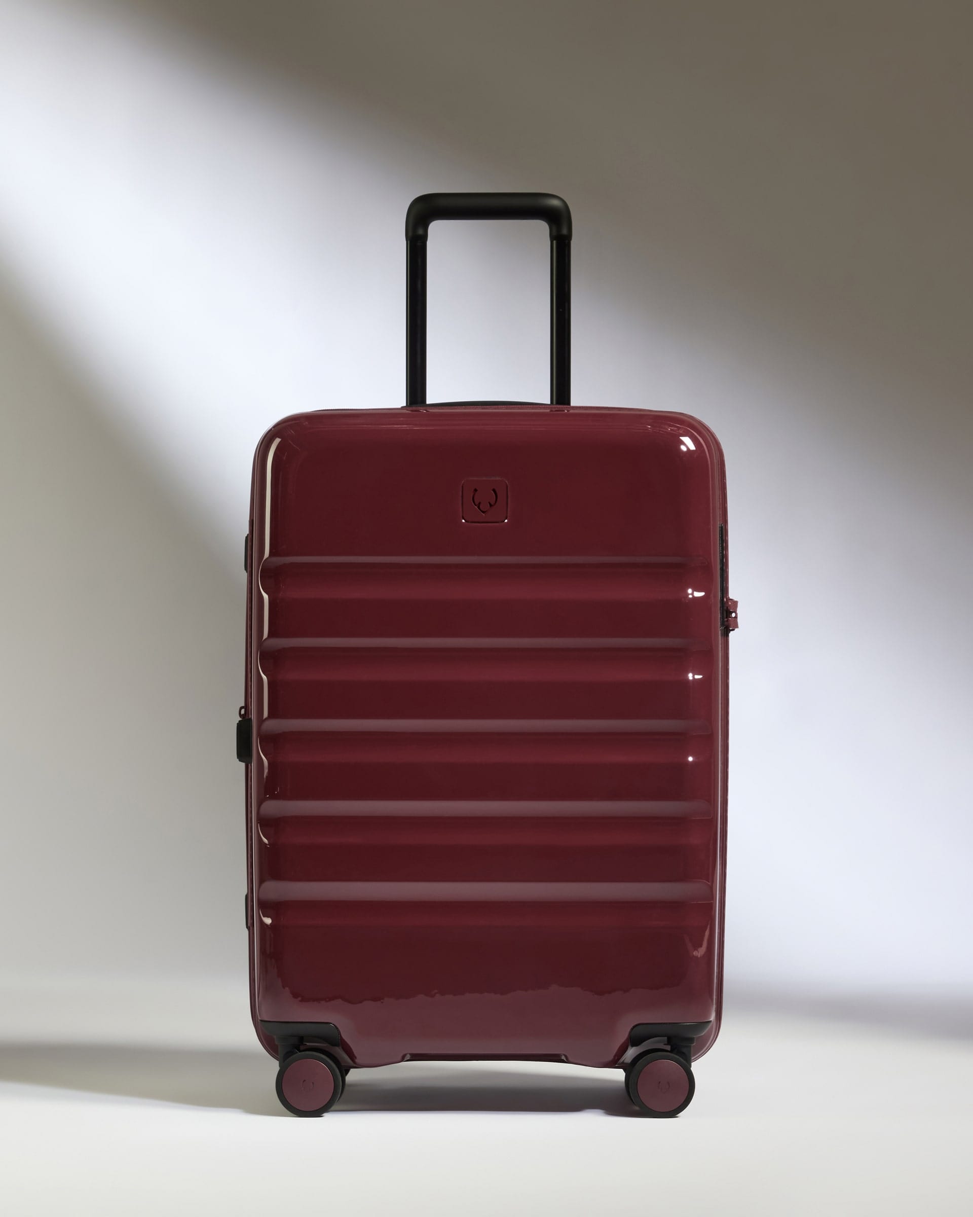 Antler Luggage -  Medium Suitcase in Cedar Red Gloss - Icon Stripe - Hard Suitcase Medium Suitcase in Red Gloss - Icon Stripe | Lightweight & Hard Shell Suitcase