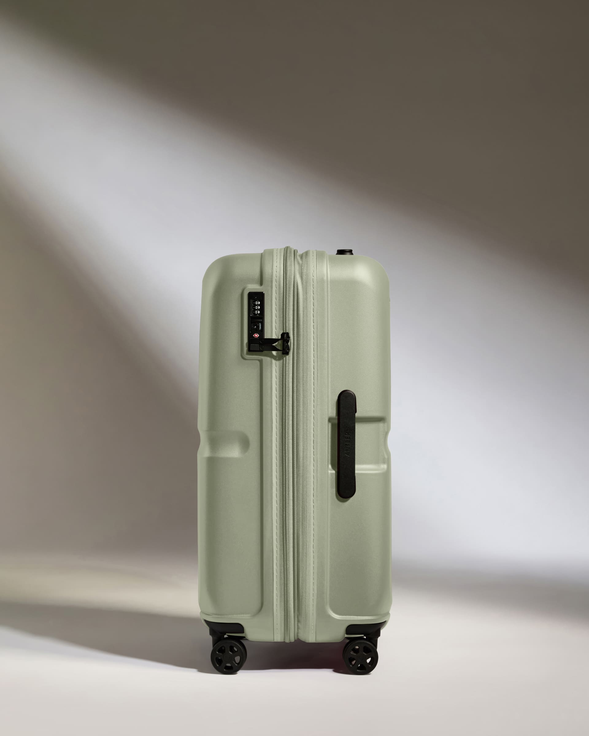 Antler Luggage -  Medium Suitcase in Clover Green - Single Stripe - Hard Suitcase Medium Suitcase in Light Green - Single Stripe | Check Luggage