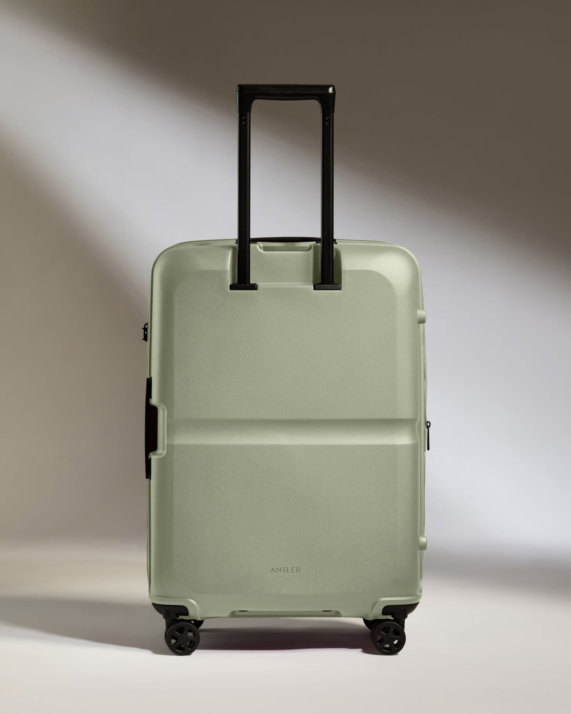 Antler Luggage -  Medium Suitcase in Clover Green - Single Stripe - Hard Suitcase Medium Suitcase in Light Green - Single Stripe | Check Luggage