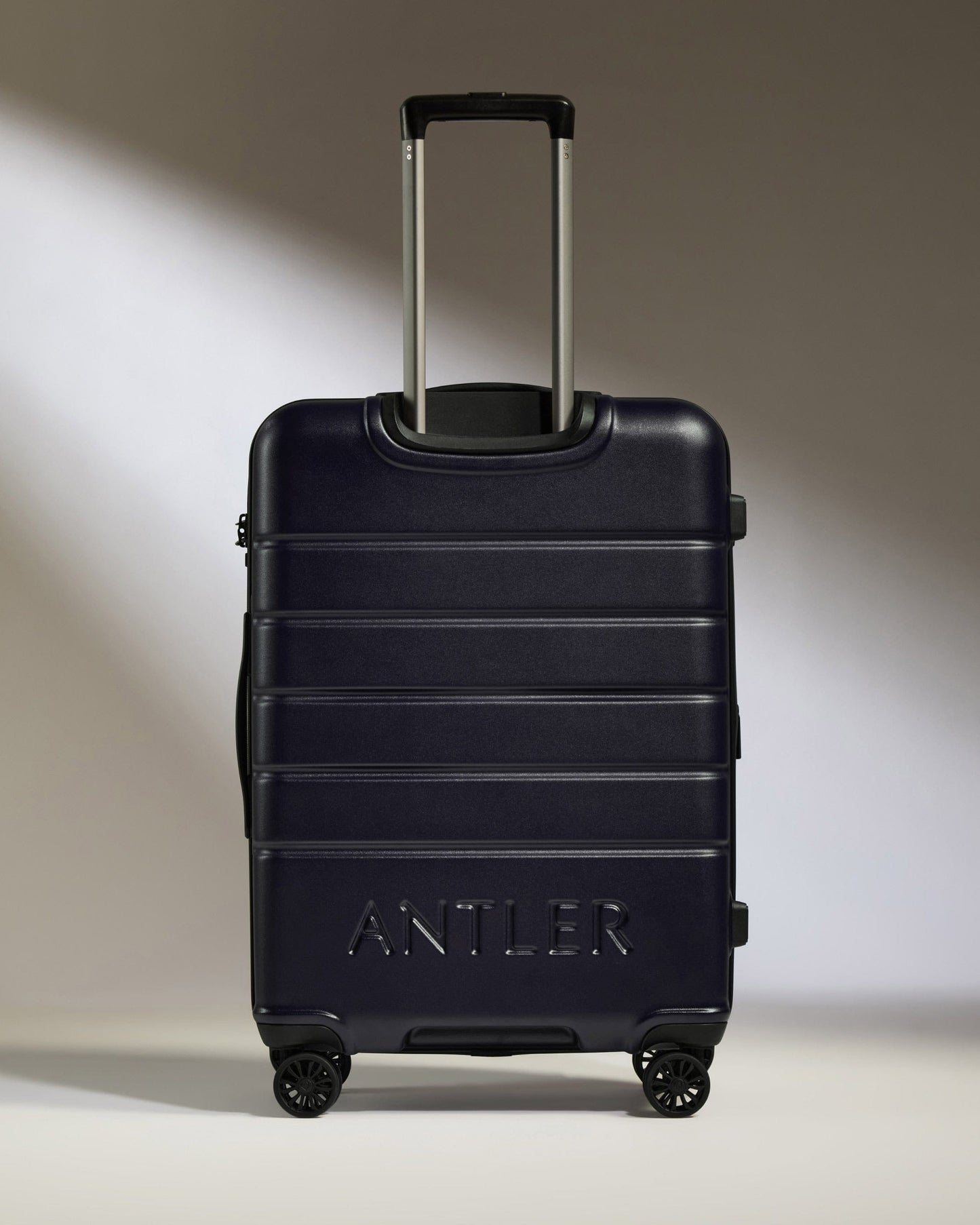 Antler Luggage -  Medium Suitcase in Dark Purple - Logo - Hard Suitcase - Medium Medium Suitcase Dark Purple - Logo | Lightweight Hard Shell Luggage