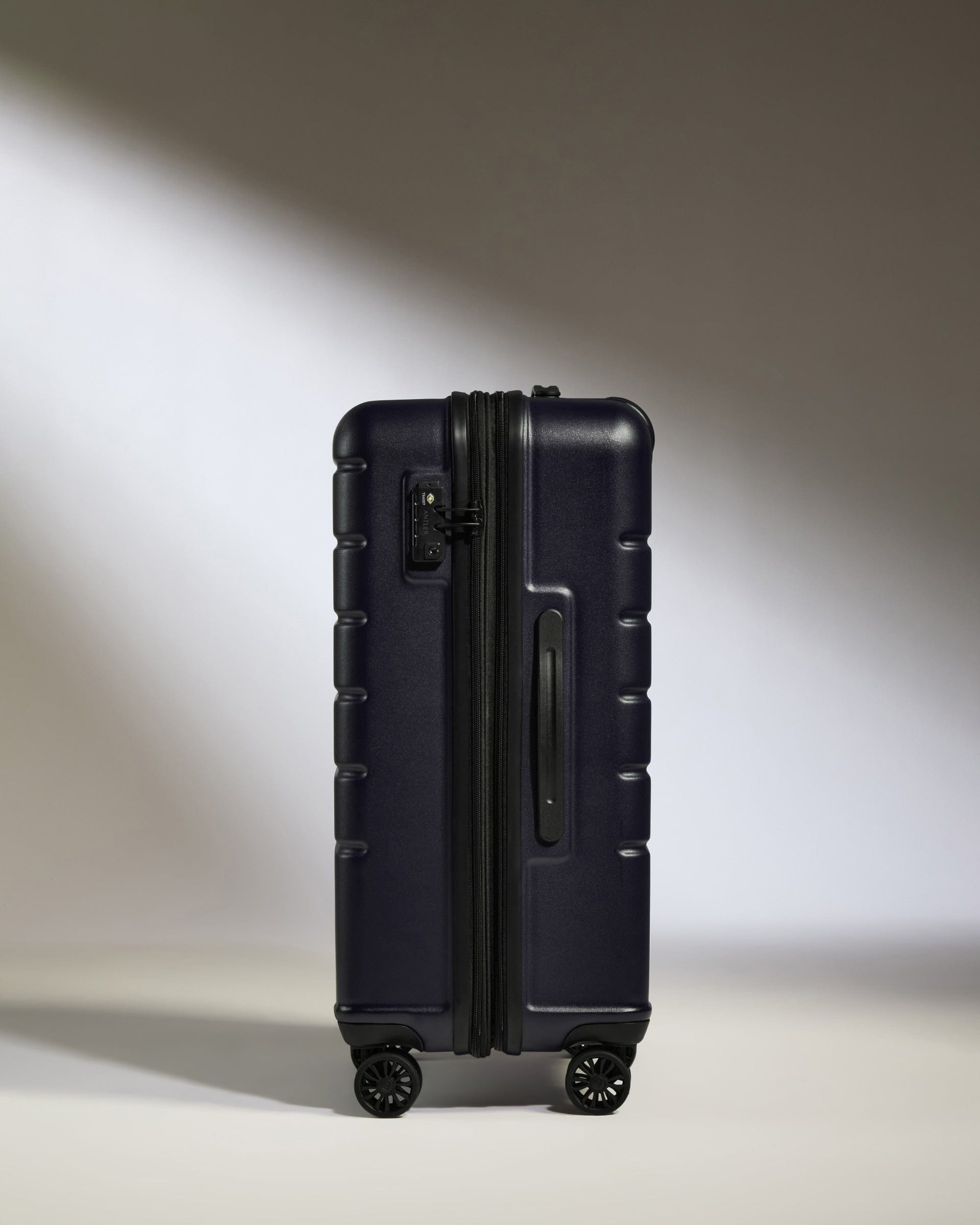 Antler Luggage -  Medium Suitcase in Dark Purple - Logo - Hard Suitcase - Medium Medium Suitcase Dark Purple - Logo | Lightweight Hard Shell Luggage