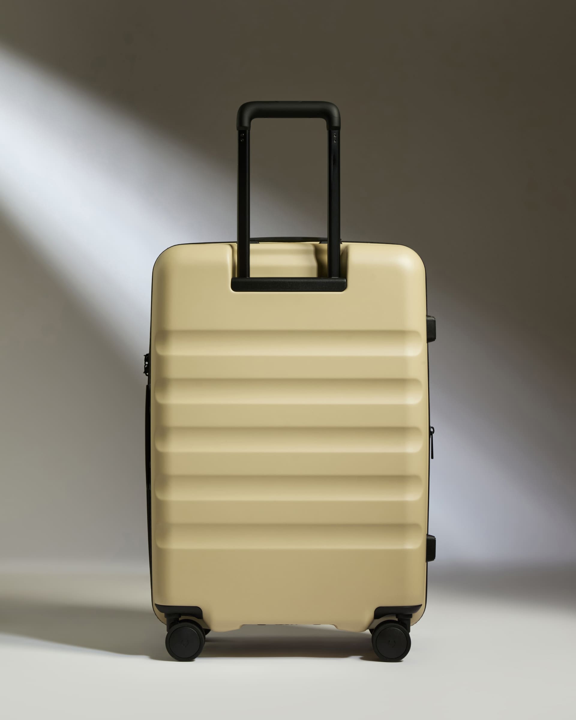 Antler Luggage -  Medium Suitcase in Dune Yellow - Icon Stripe - Hard Suitcase Icon Stripe Medium Suitcase in Yellow | Lightweight & Hard Shell Suitcase