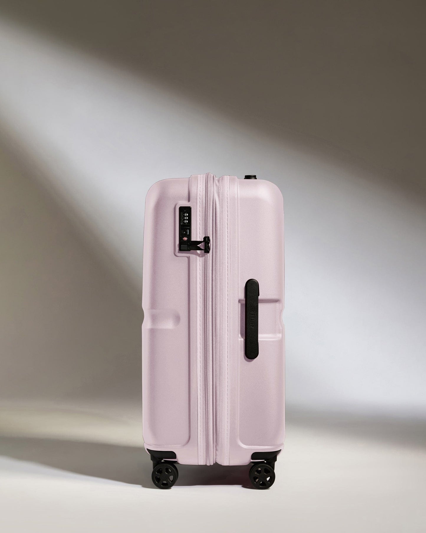 Antler Luggage -  Medium Suitcase in Dusk Pink - Single Stripe - Hard Suitcase - Medium Medium Suitcase in Light Pink - Single Stripe | Check Luggage