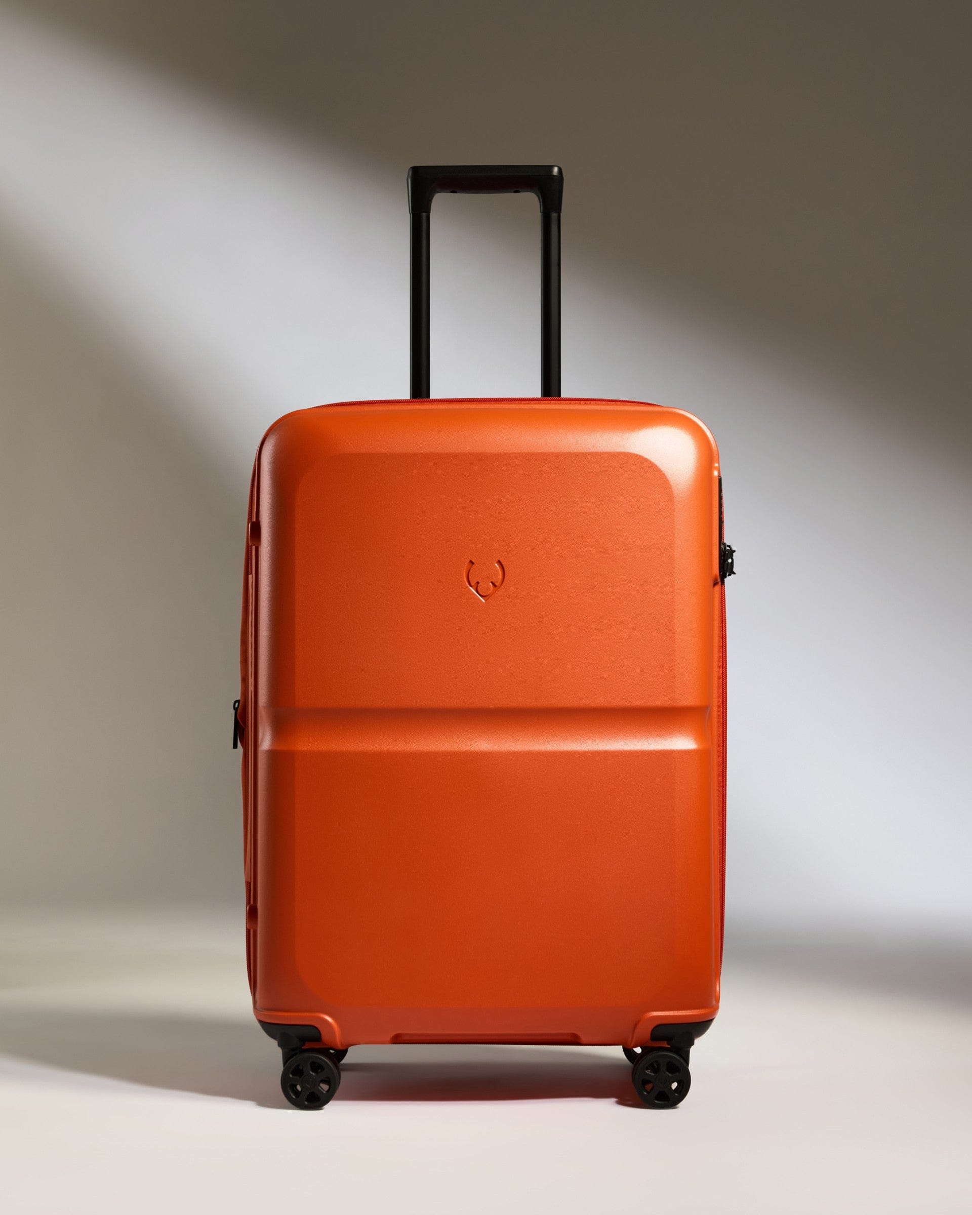 Antler Luggage -  Medium Suitcase in Ember Orange - Single Stripe - Hard Suitcase Medium Suitcase in Orange - Single Stripe | Check Luggage