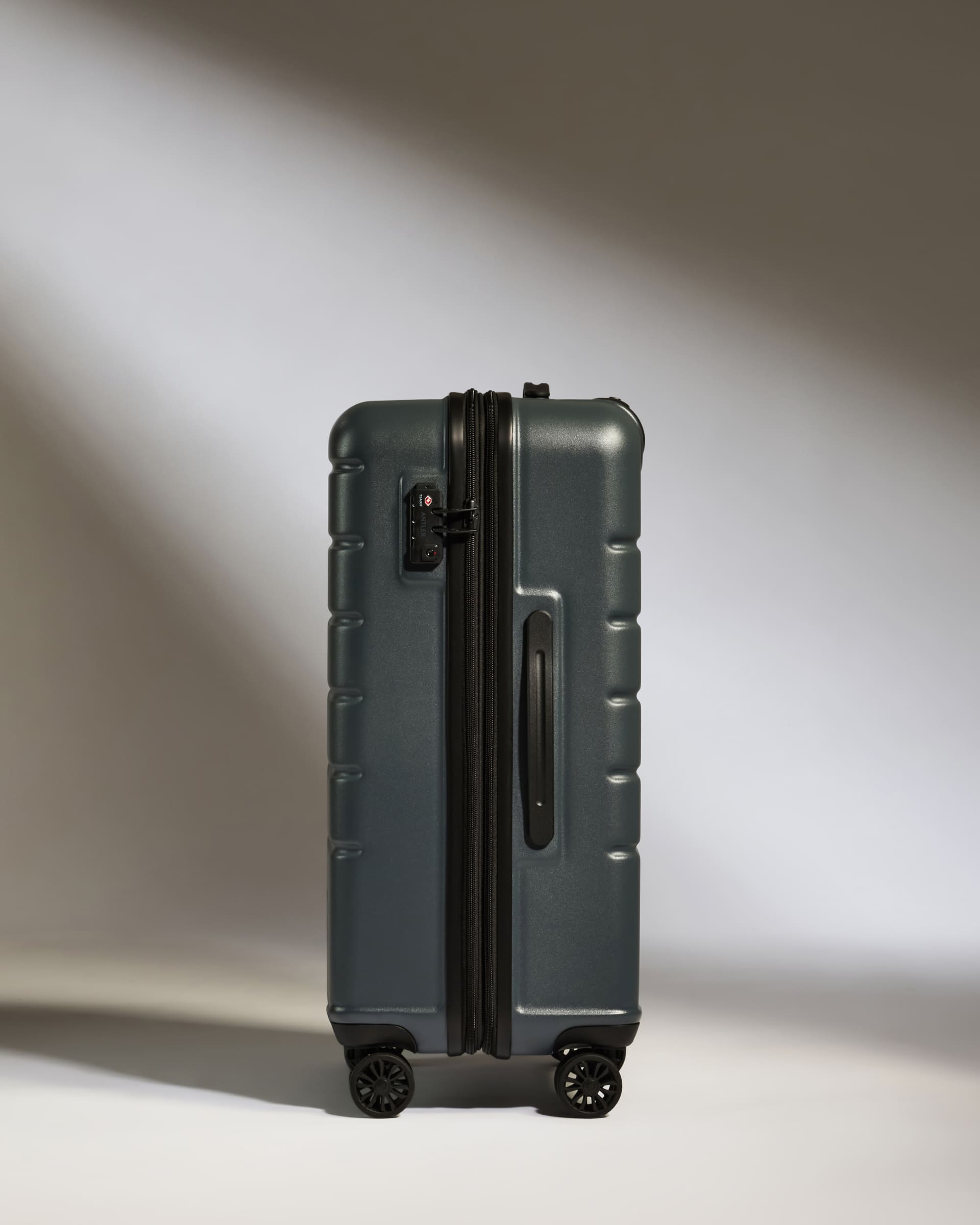 Antler Luggage -  Medium Suitcase in Granite Grey - Logo - Hard Suitcases Medium Suitcase in Grey - Logo | Lightweight Hard Shell Luggage
