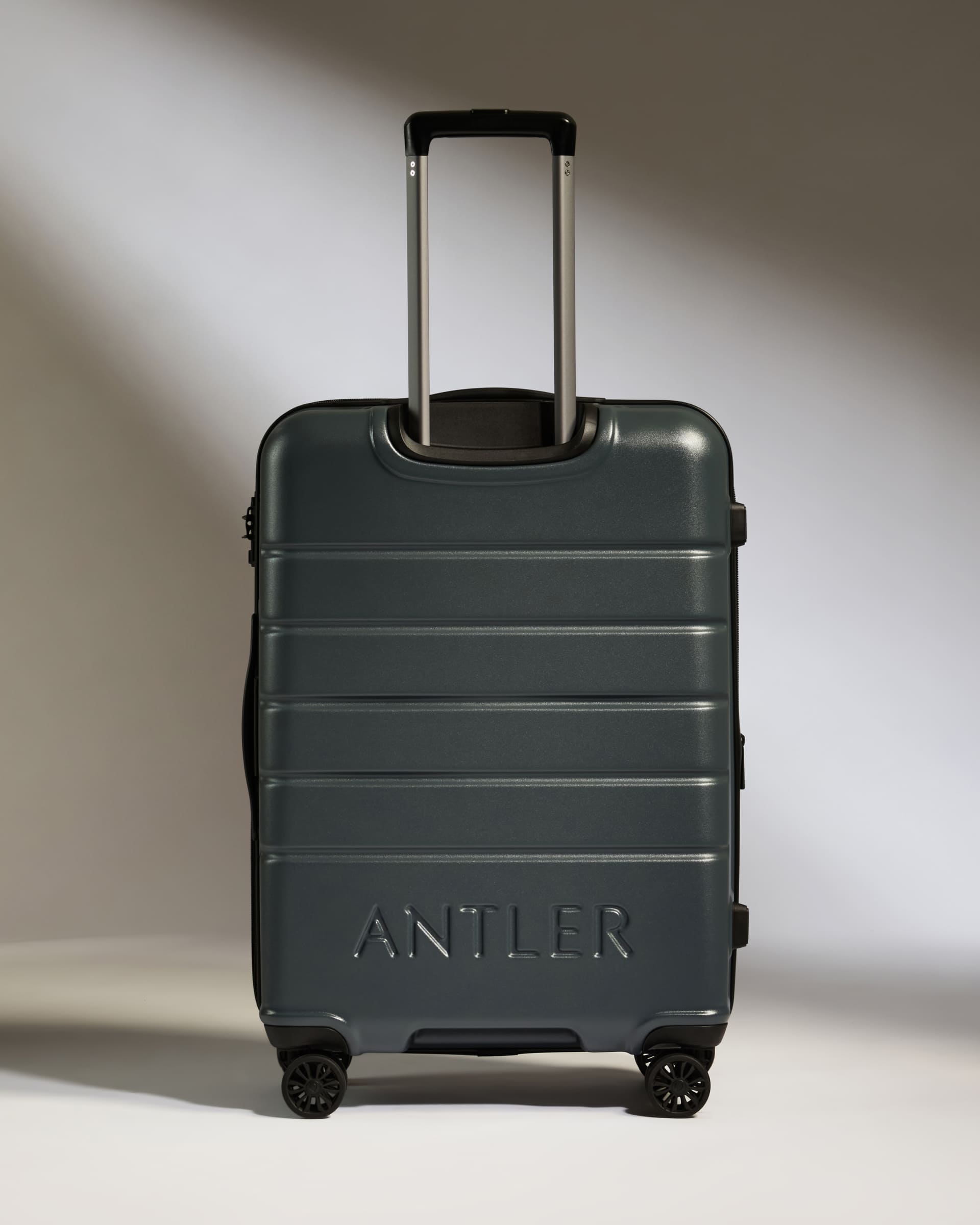 Antler Luggage -  Medium Suitcase in Granite Grey - Logo - Hard Suitcases Medium Suitcase in Grey - Logo | Lightweight Hard Shell Luggage