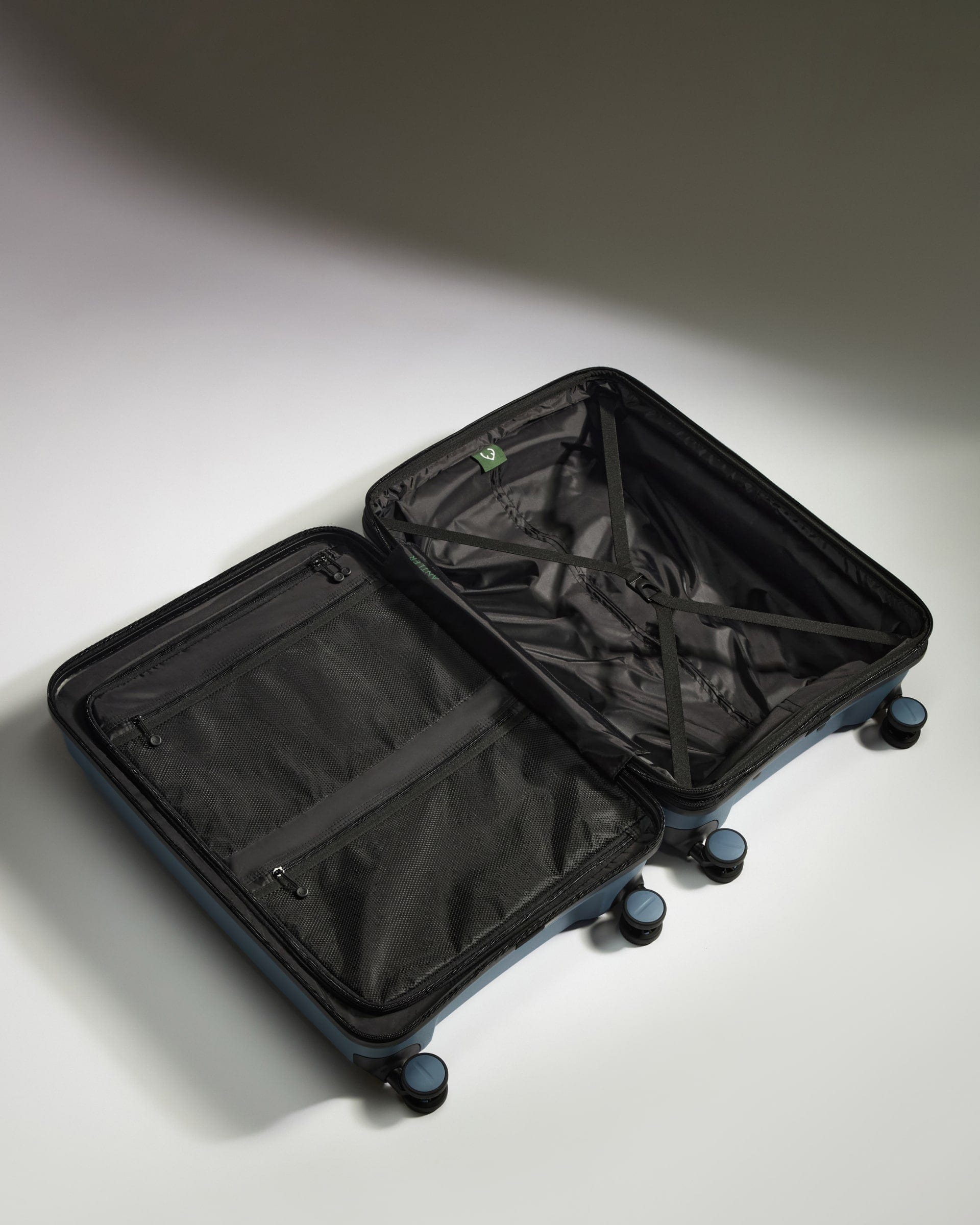 Antler Luggage -  Medium Suitcase in Light Blue - Logo Stripe - Hard Suitcase - Medium Medium Suitcase Light Blue - Logo Stripe | Lightweight Hard Shell Luggage