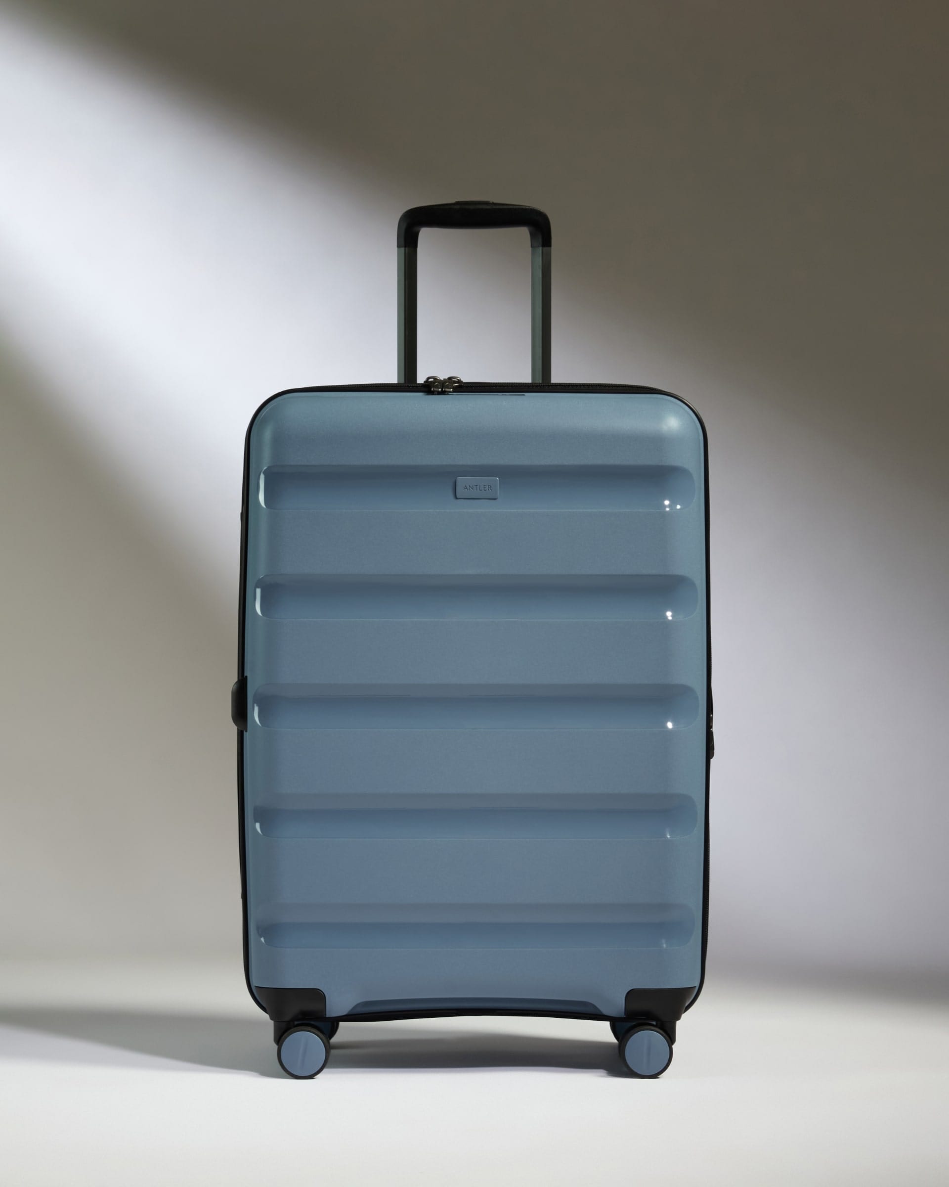 Antler Luggage -  Medium Suitcase in Light Blue - Logo Stripe - Hard Suitcase - Medium Medium Suitcase Light Blue - Logo Stripe | Lightweight Hard Shell Luggage