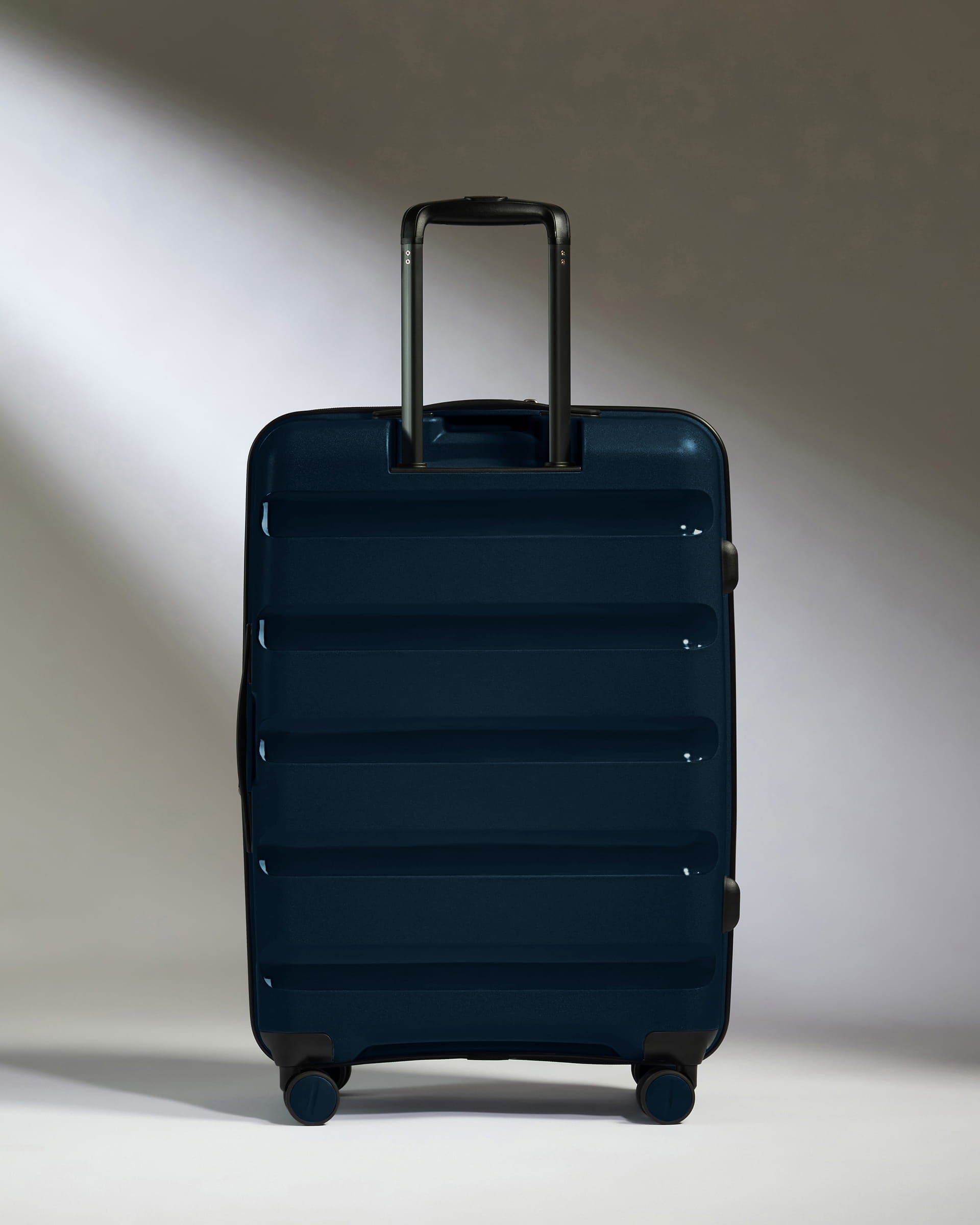 Antler Luggage -  Medium Suitcase in Midnight Blue - Logo Stripe - Hard Suitcase - Medium Medium Suitcase Midnight Blue - Logo Stripe | Lightweight Hard Shell Luggage