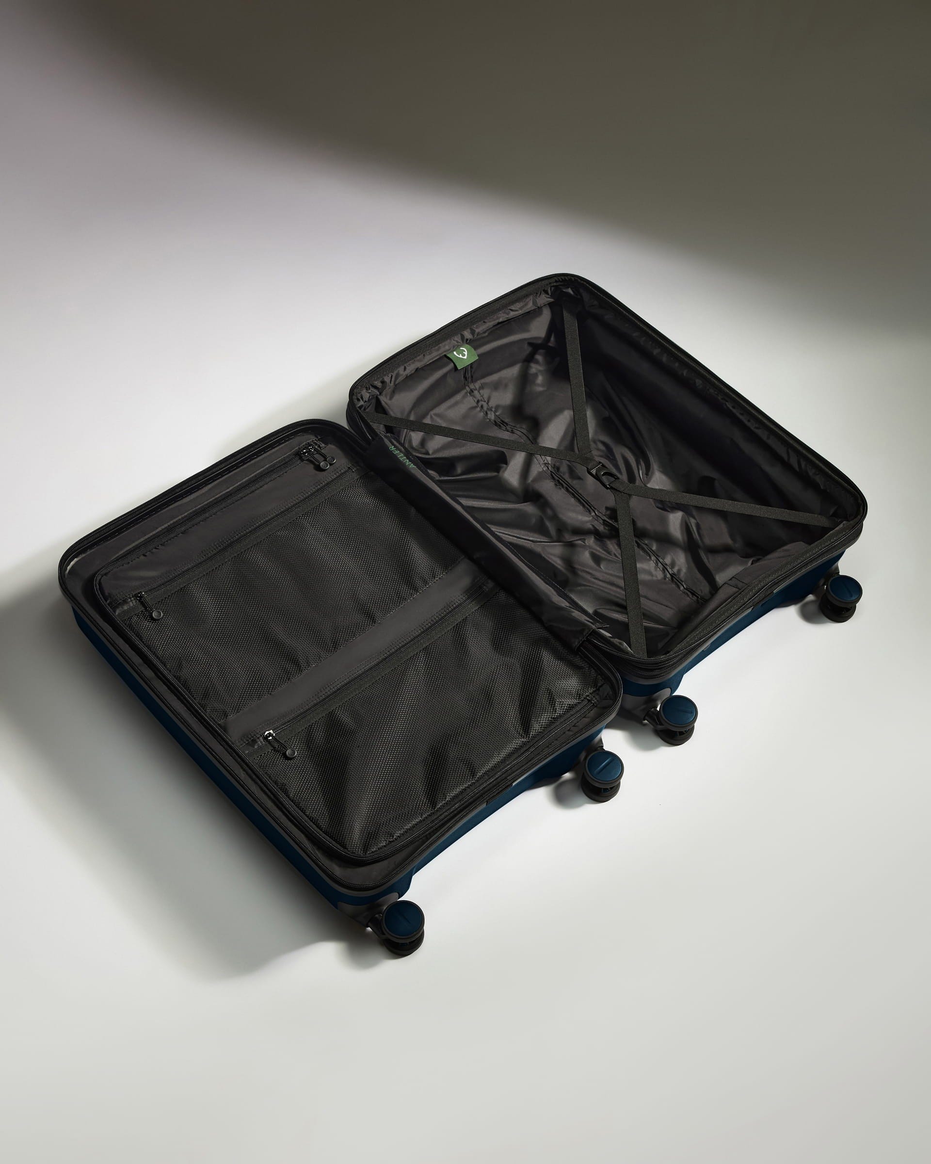 Antler Luggage -  Medium Suitcase in Midnight Blue - Logo Stripe - Hard Suitcase - Medium Medium Suitcase Midnight Blue - Logo Stripe | Lightweight Hard Shell Luggage