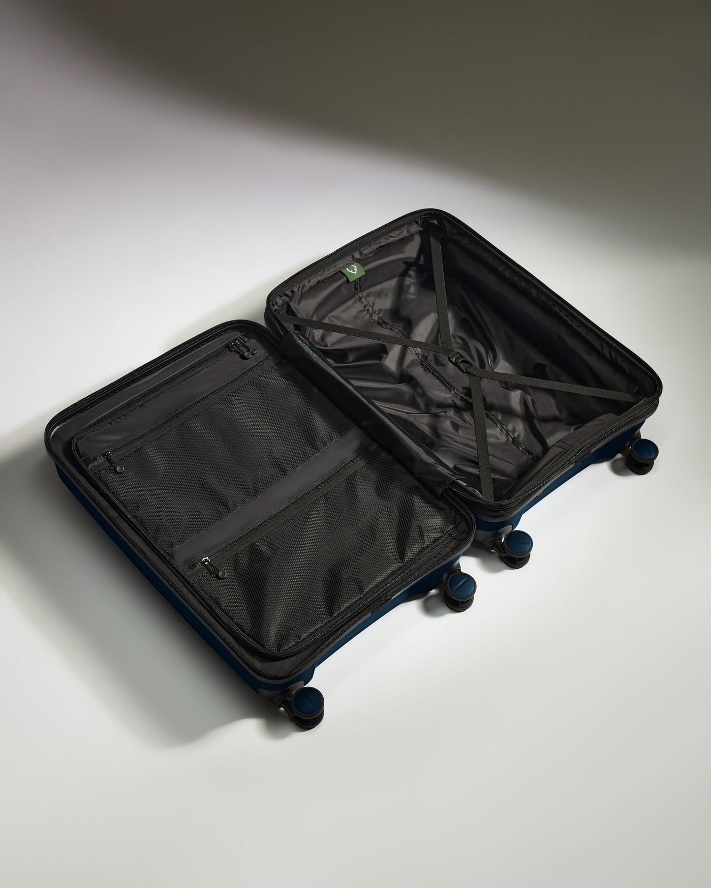 Antler Luggage -  Medium Suitcase in Midnight Blue - Logo Stripe - Hard Suitcase - Medium Medium Suitcase Midnight Blue - Logo Stripe | Lightweight Hard Shell Luggage