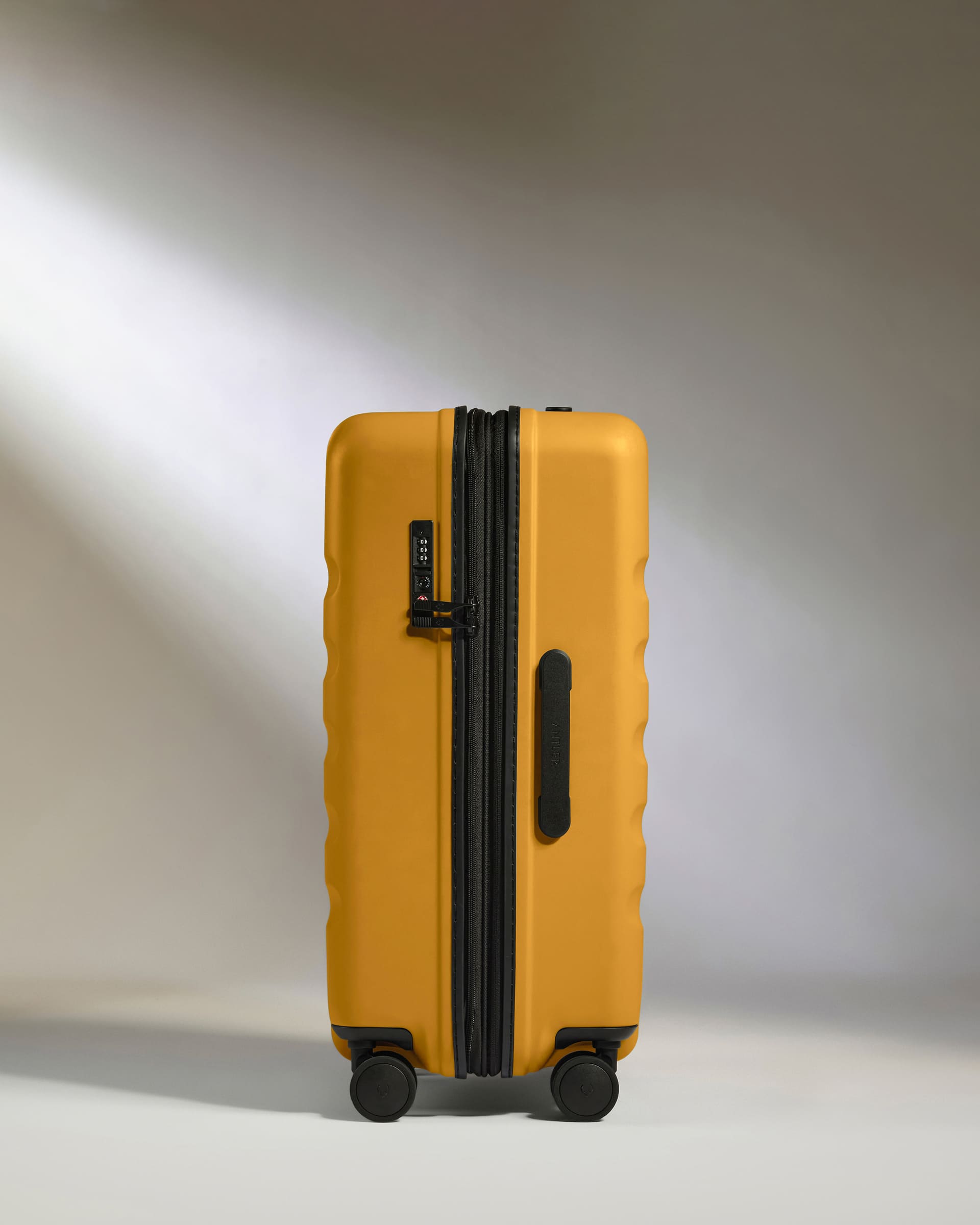 Antler Luggage -  Medium Suitcase in Mustard Yellow - Icon Stripe - Hard Suitcase - Medium Icon Stripe Medium Suitcase in Dark Yellow | Lightweight & Hard Shell Suitcase