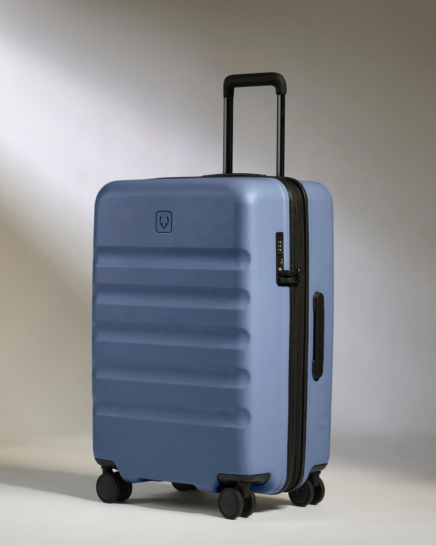 Antler Luggage -  Medium Suitcase in Ocean Blue - Icon Stripe - Hard Suitcase - Medium Medium suitcase in Blue - Icon Stripe | Lightweight & Hard Shell Suitcase