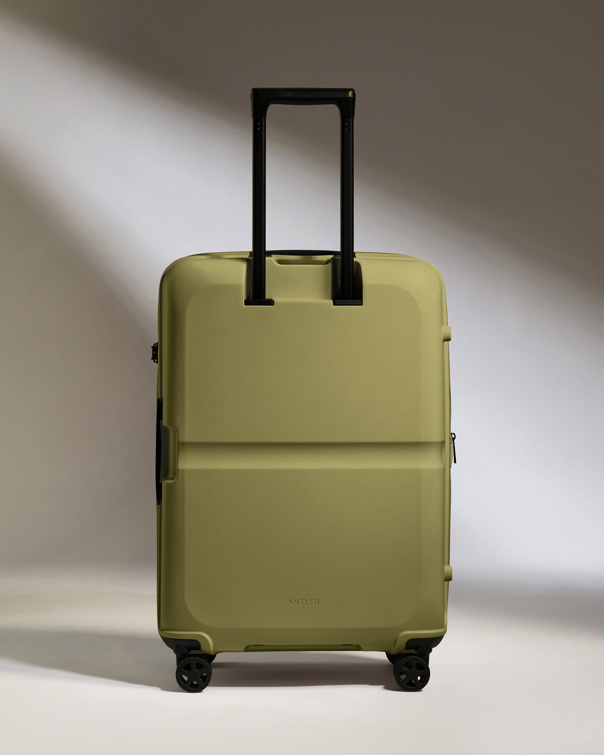 Antler Luggage -  Medium Suitcase in Reed Green - Single Stripe - Hard Suitcase - Medium Medium Suitcase in Green - Single Stripe | Check Luggage