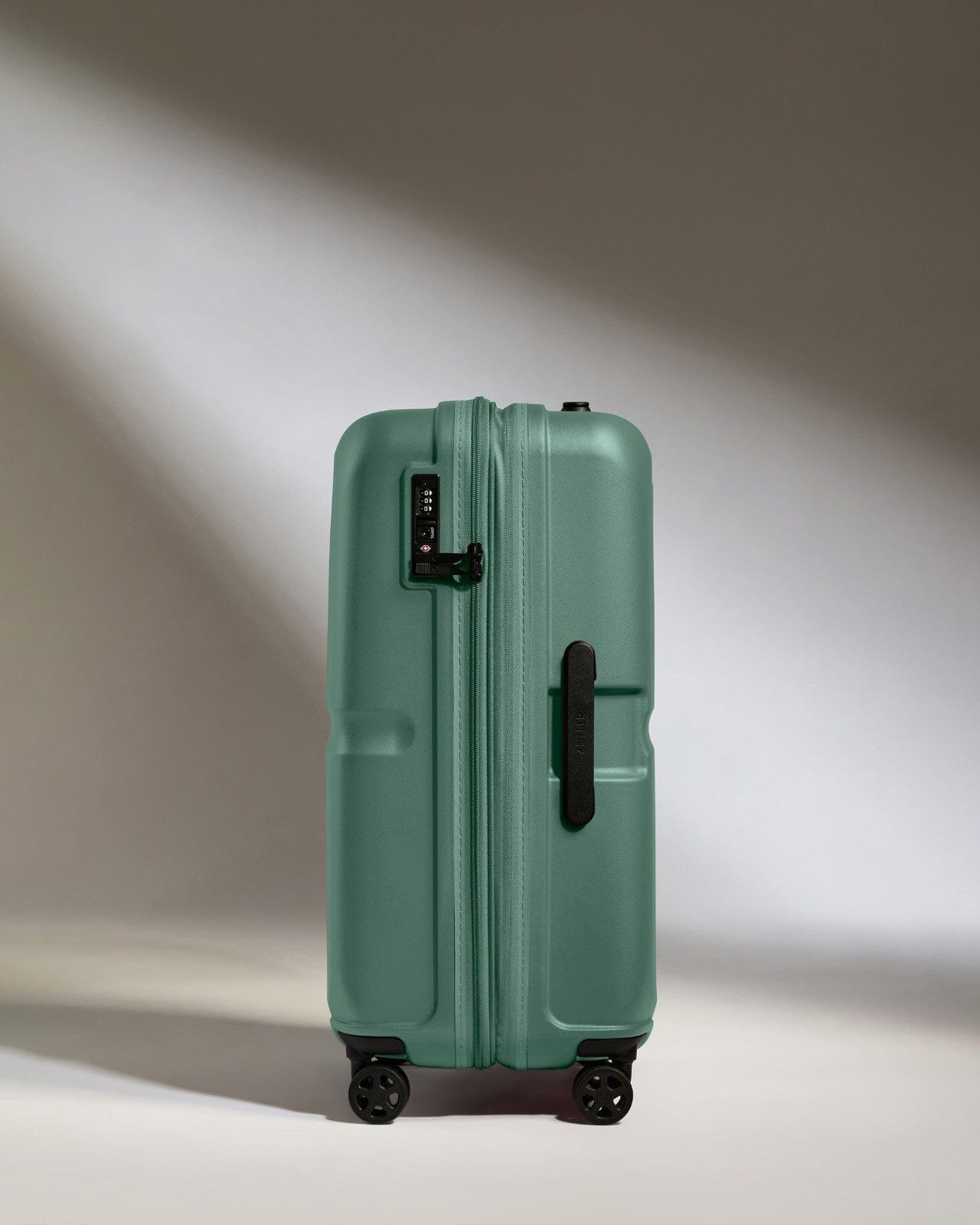Antler Luggage -  Medium Suitcase in Seagrass Green - Single Stripe - Hard Suitcase - Medium Medium Suitcase in Green - Single Stripe | Check Luggage