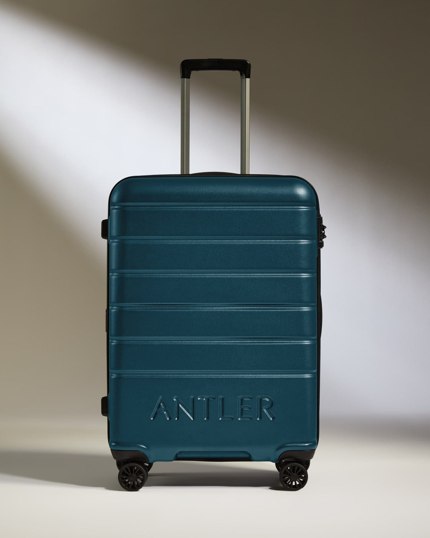 Antler Luggage -  Medium Suitcase in Soft Blue - Logo - Hard Suitcases Medium Suitcase Soft Blue - Logo | Lightweight Hard Shell Luggage