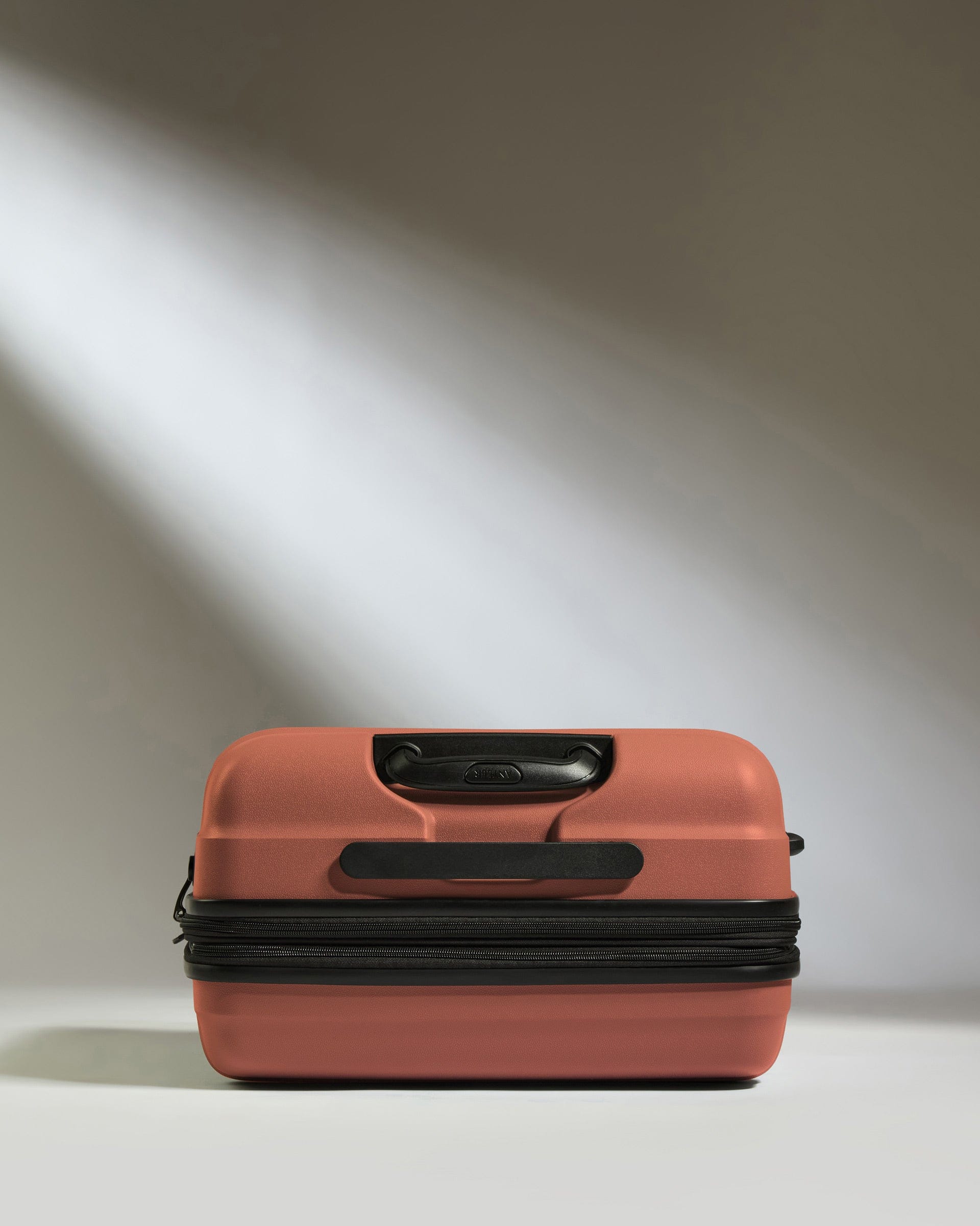 Antler Luggage -  Medium Suitcase in Soft Orange - Juno - Hard Suitcase Medium Suitcase in Soft Orange - Juno | Checked Luggage & Medium Suitcases