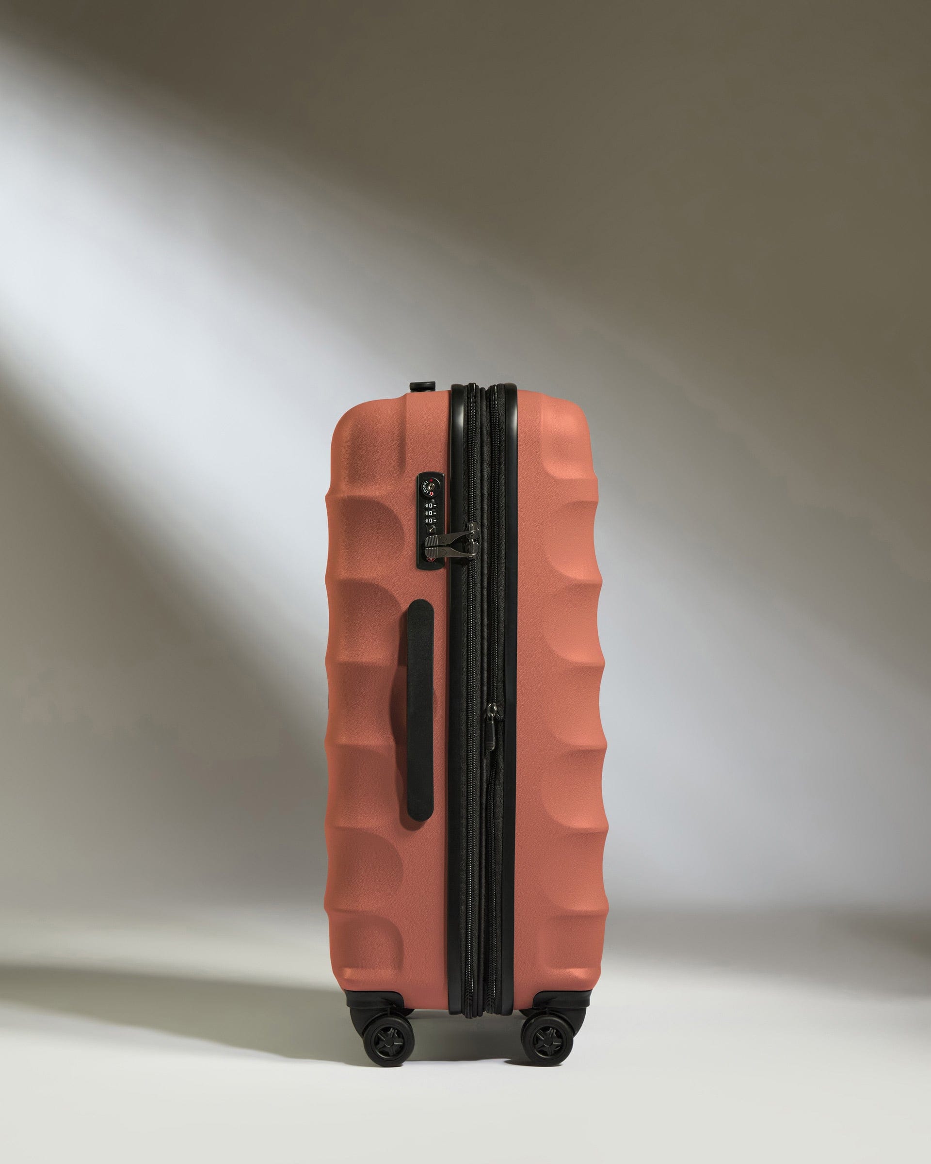 Antler Luggage -  Medium Suitcase in Soft Orange - Juno - Hard Suitcase Medium Suitcase in Soft Orange - Juno | Checked Luggage & Medium Suitcases