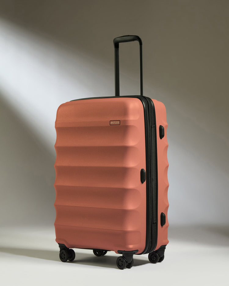 Antler Luggage -  Medium Suitcase in Soft Orange - Juno - Hard Suitcase Medium Suitcase in Soft Orange - Juno | Checked Luggage & Medium Suitcases