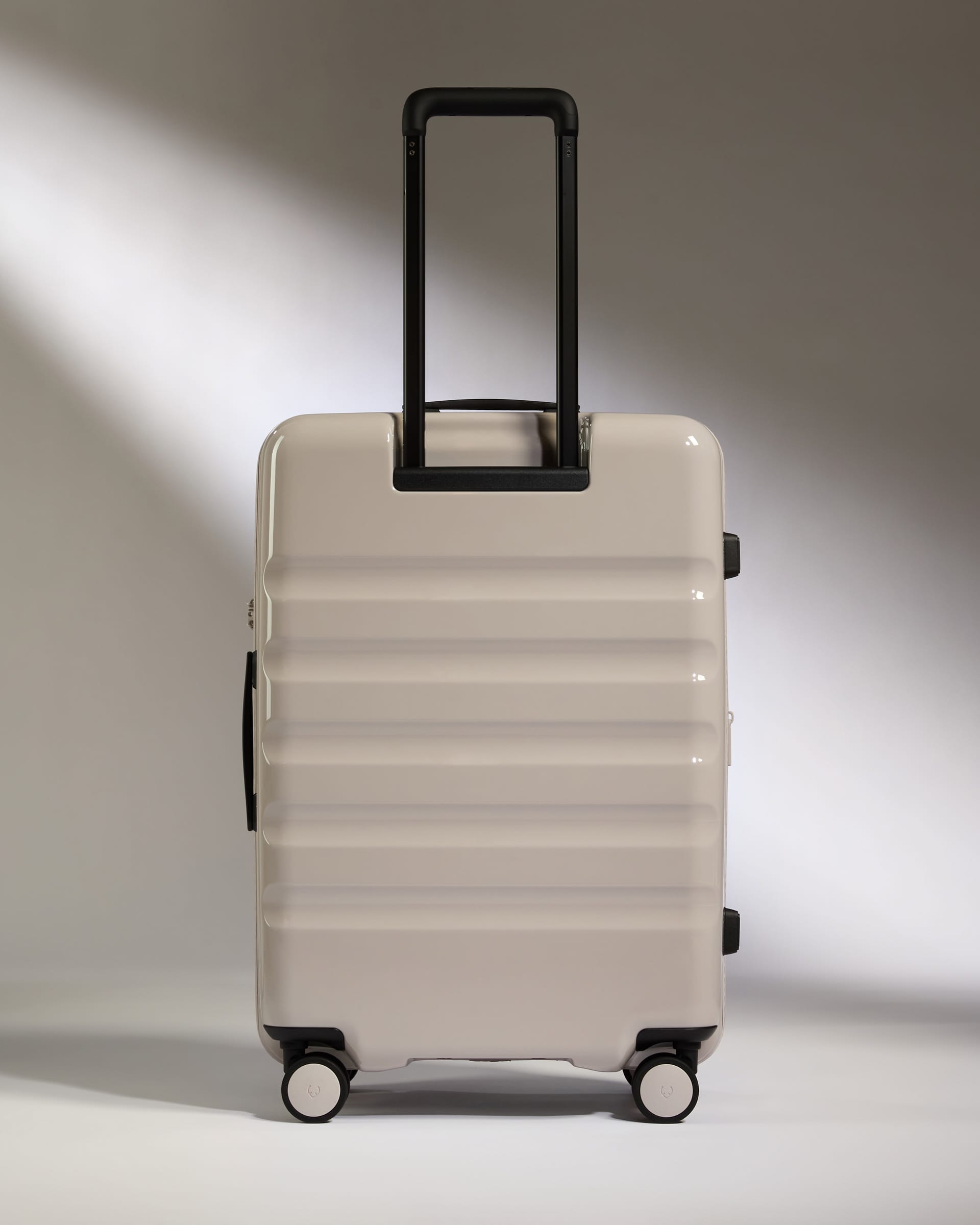 Antler Luggage -  Medium Suitcase in Taupe Gloss - Icon Stripe - Hard Suitcase Medium Suitcase in Taupe Gloss - Icon Stripe | Lightweight & Hard Shell Suitcase