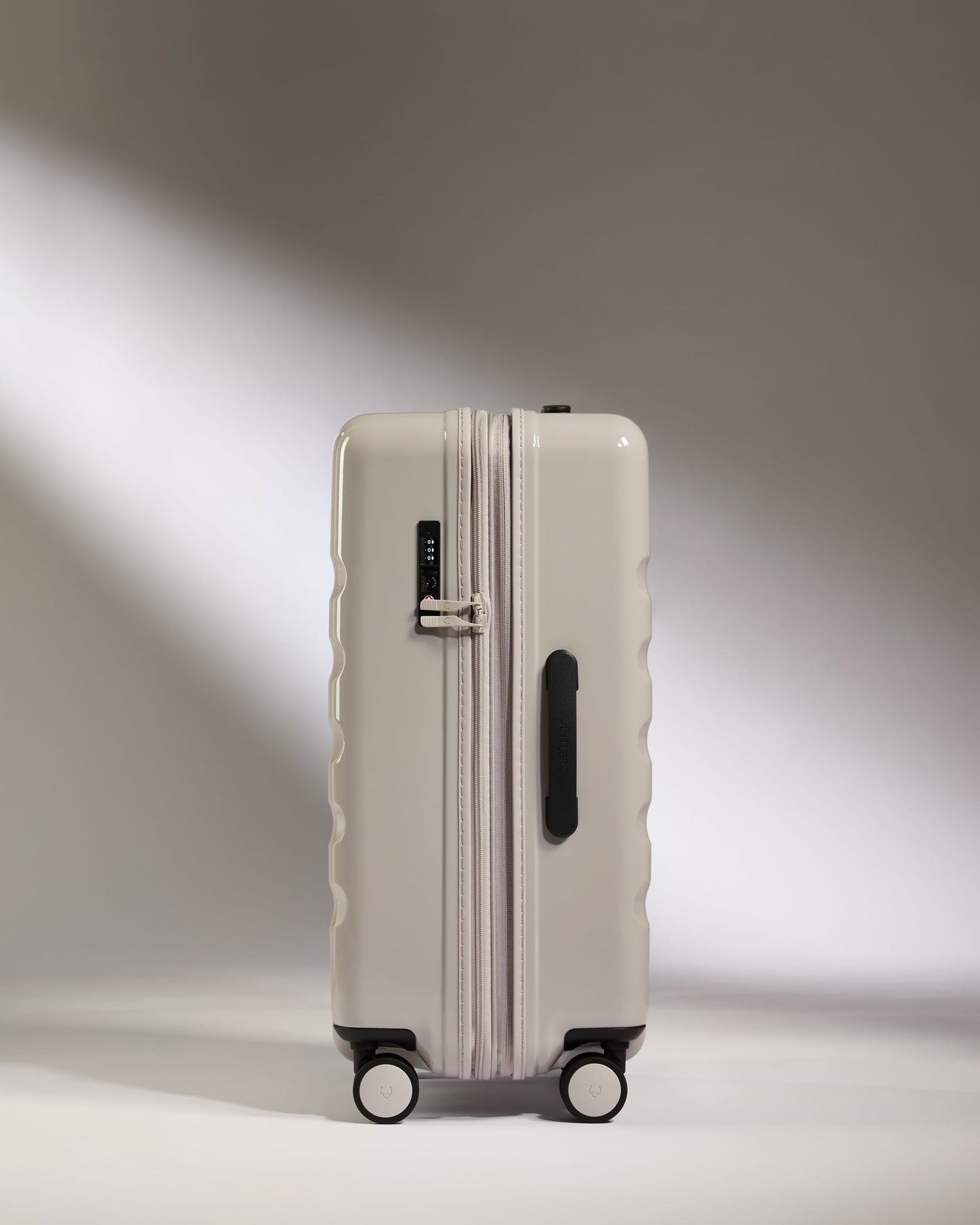 Antler Luggage -  Medium Suitcase in Taupe Gloss - Icon Stripe - Hard Suitcase Medium Suitcase in Taupe Gloss - Icon Stripe | Lightweight & Hard Shell Suitcase