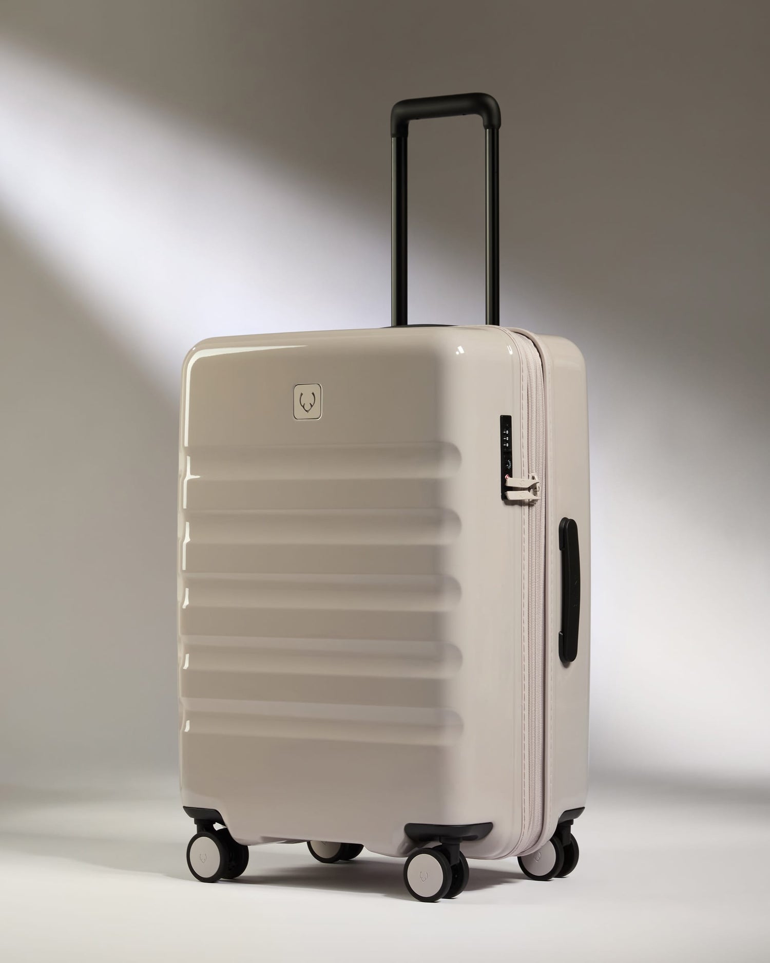Antler Luggage -  Medium Suitcase in Taupe Gloss - Icon Stripe - Hard Suitcase Medium Suitcase in Taupe Gloss - Icon Stripe | Lightweight & Hard Shell Suitcase