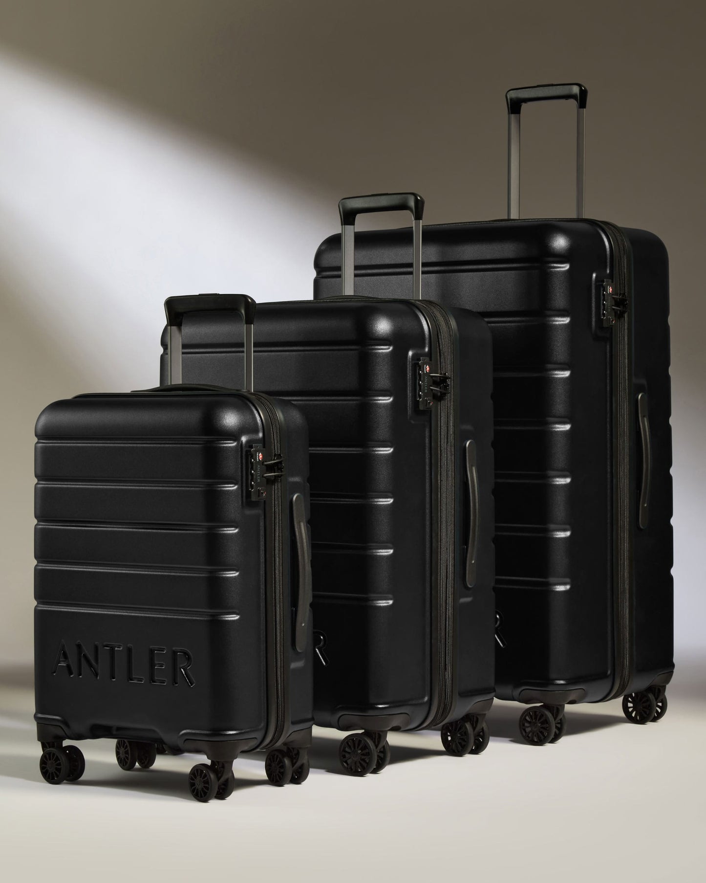 Antler Luggage -  Suitcase Set in Black - Logo - Hard Suitcases Set of 3 Suitcases Black - Logo | Lightweight Hard Shell Luggage