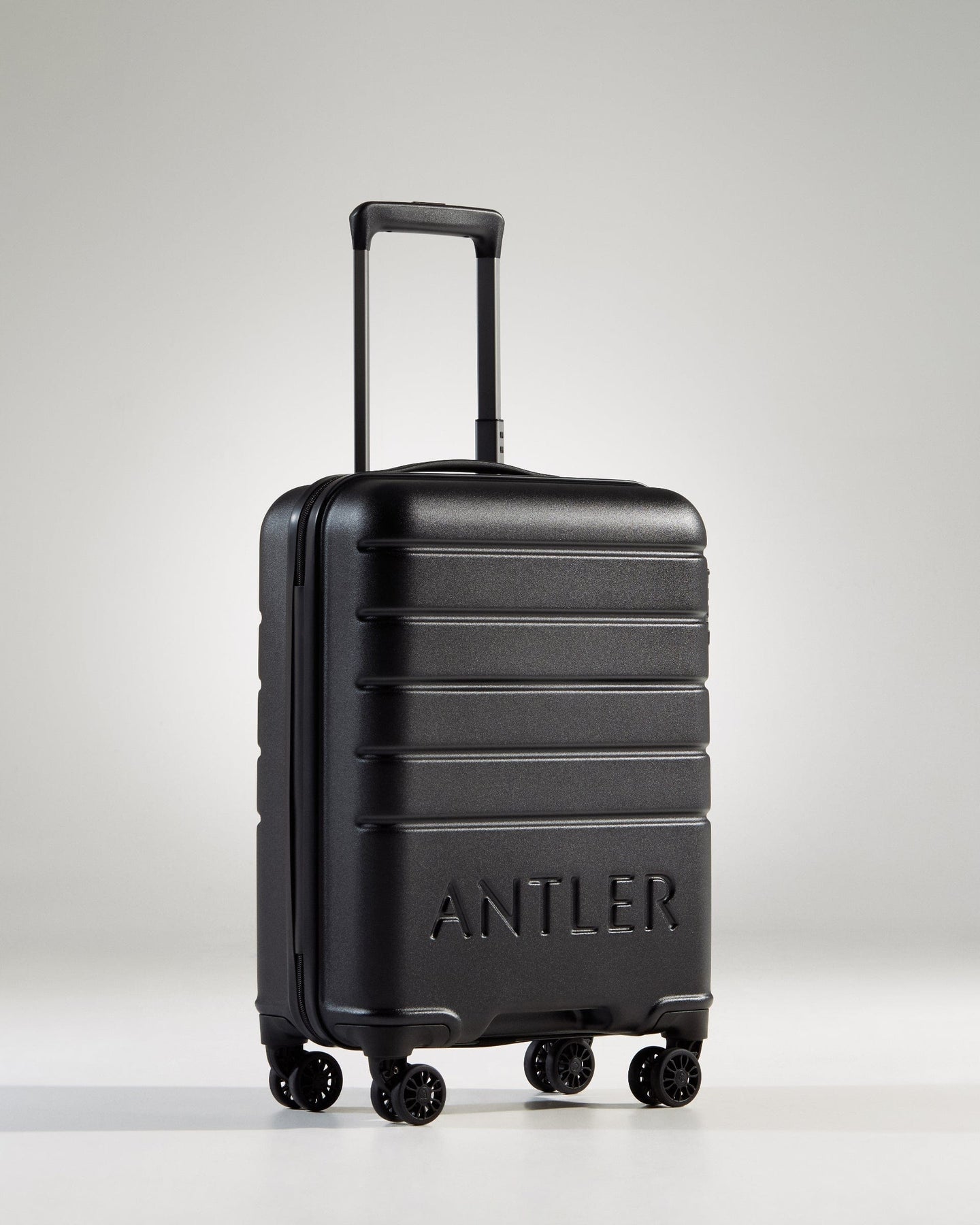Antler UK Luggage -  Logo cabin in black - Hard Suitcases Logo Cabin Suitcase Black | Lightweight Hard Shell Luggage