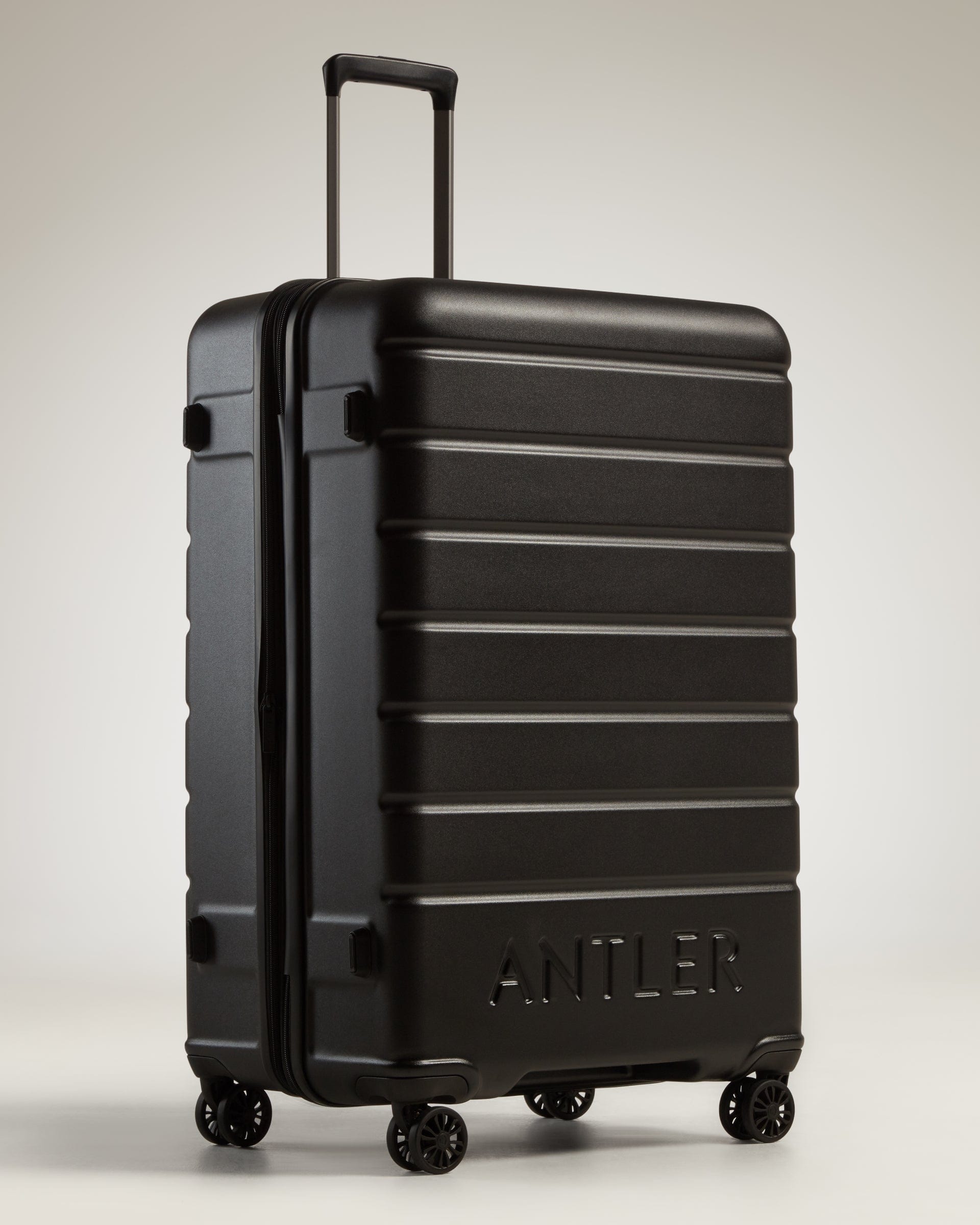 Antler UK Luggage -  Logo large in black - Hard Suitcases Logo Large Suitcase Black | Lightweight Hard Shell Luggage