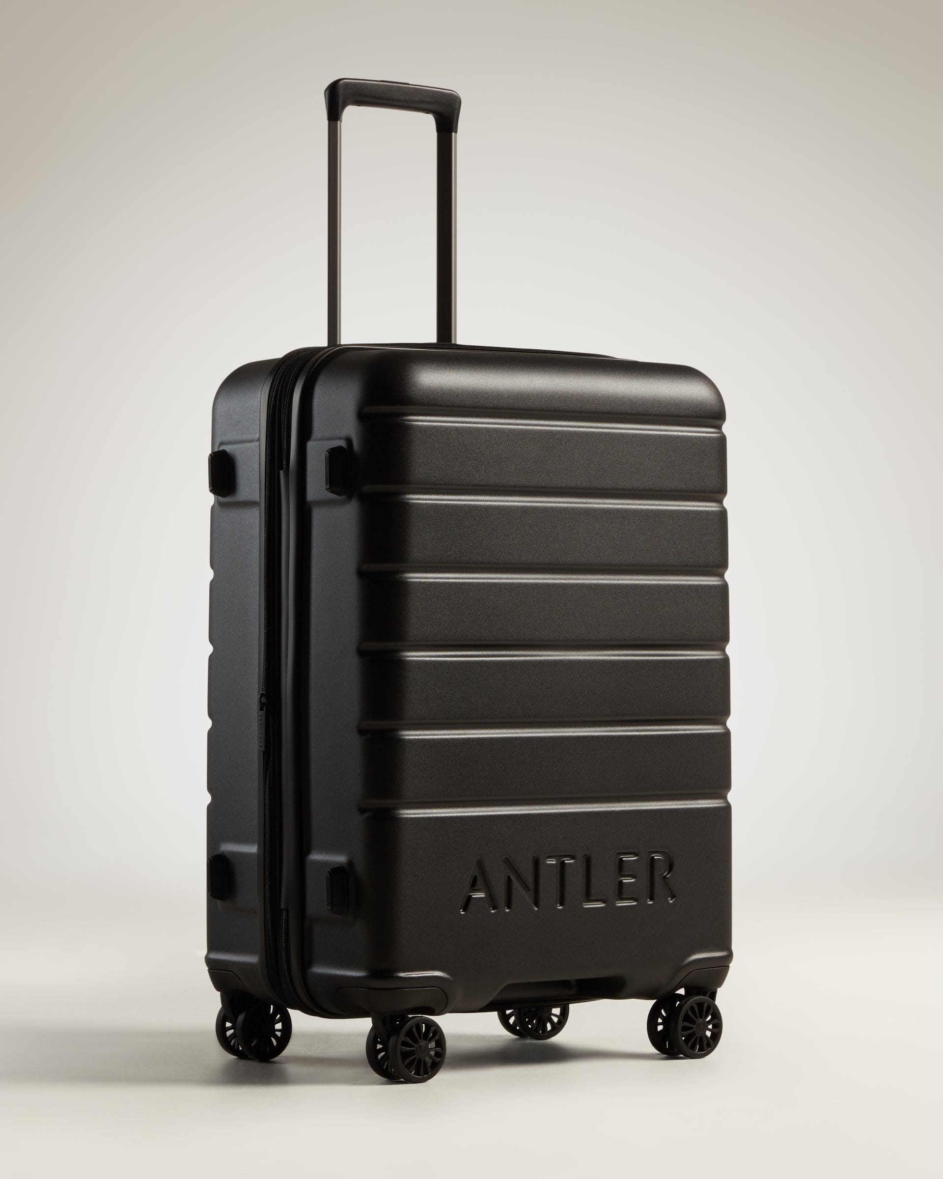 Medium Suitcase Logo